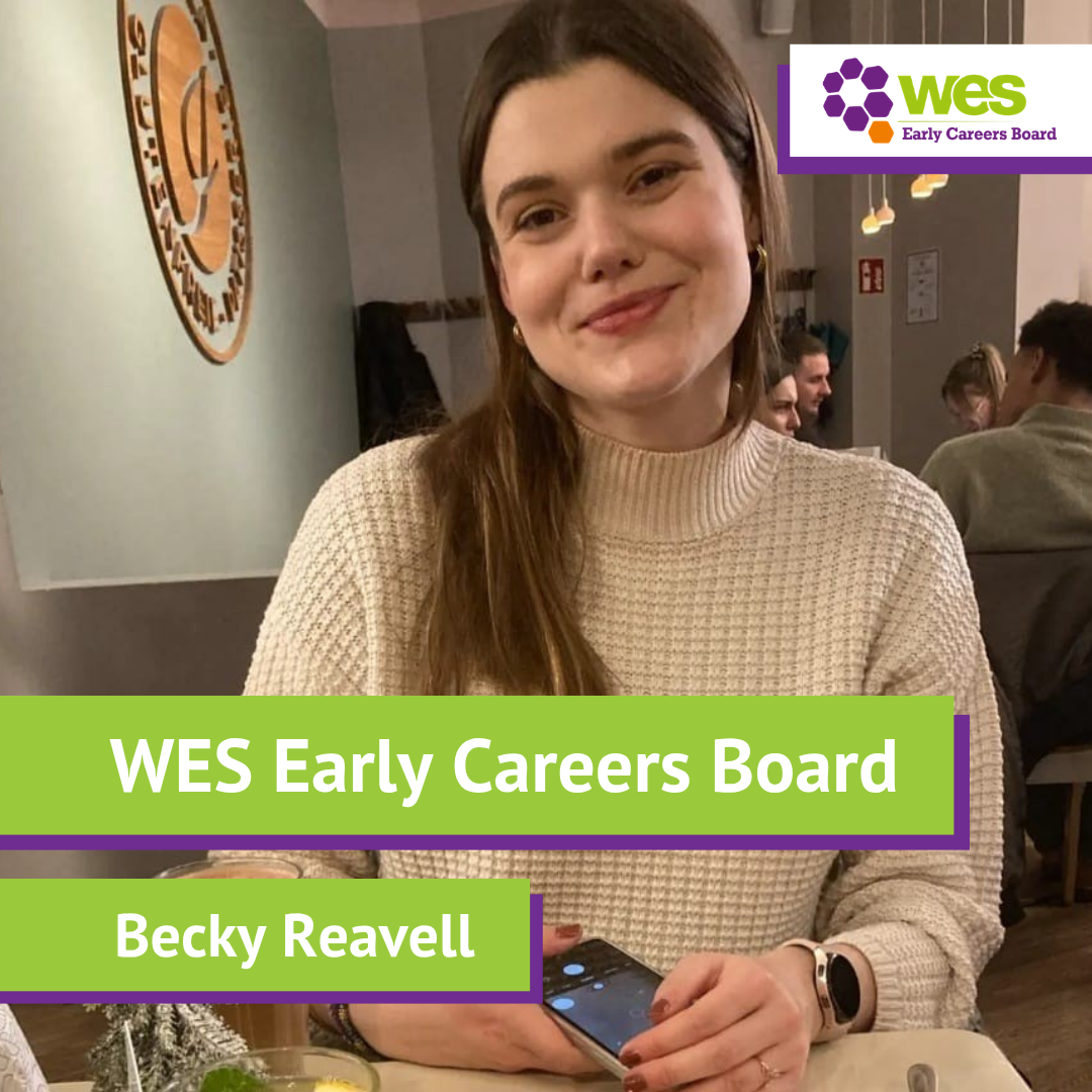 A woman with long hair smiling, wearing a beige jumper, picture has a label with white text that reads 'WES Early Careers Board'.