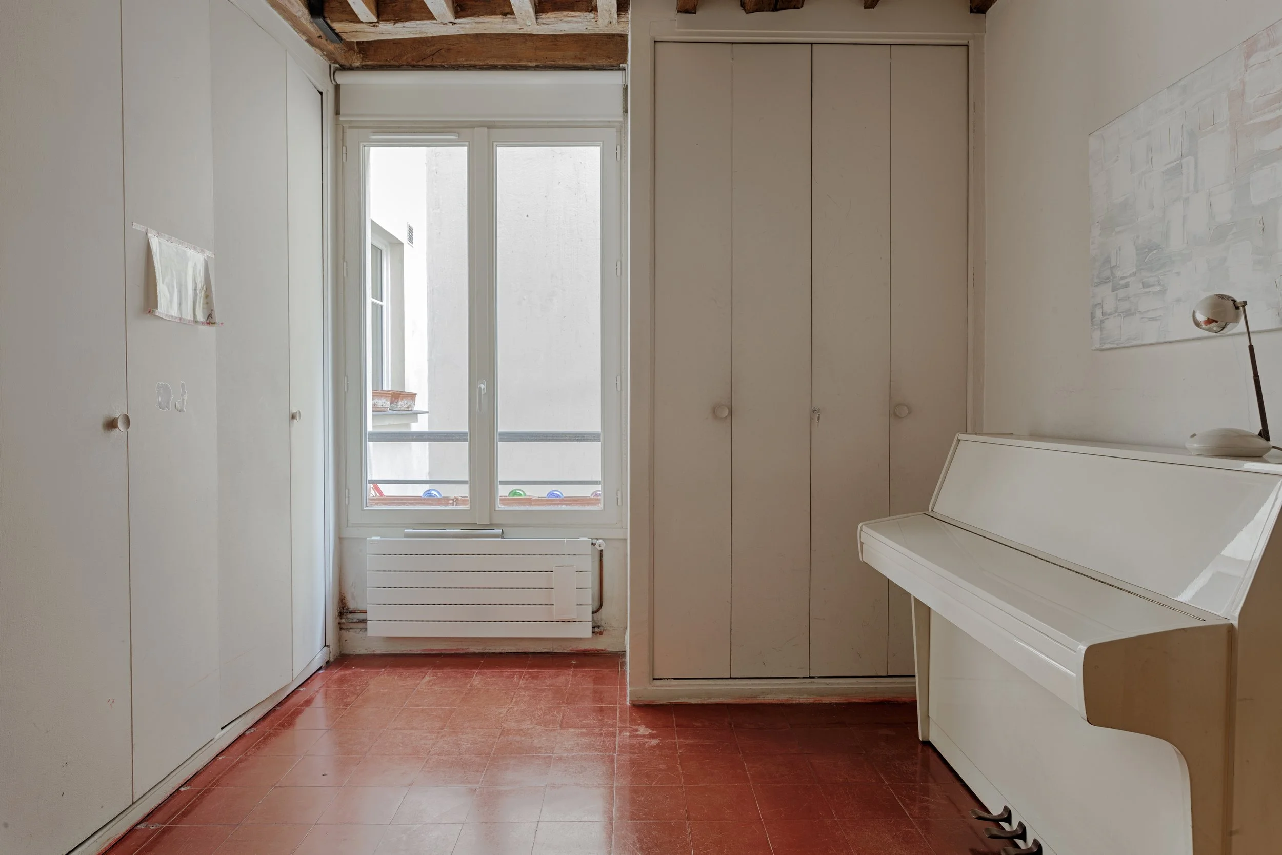 Chambre du musicien d'un appartement dans le quartier Latin