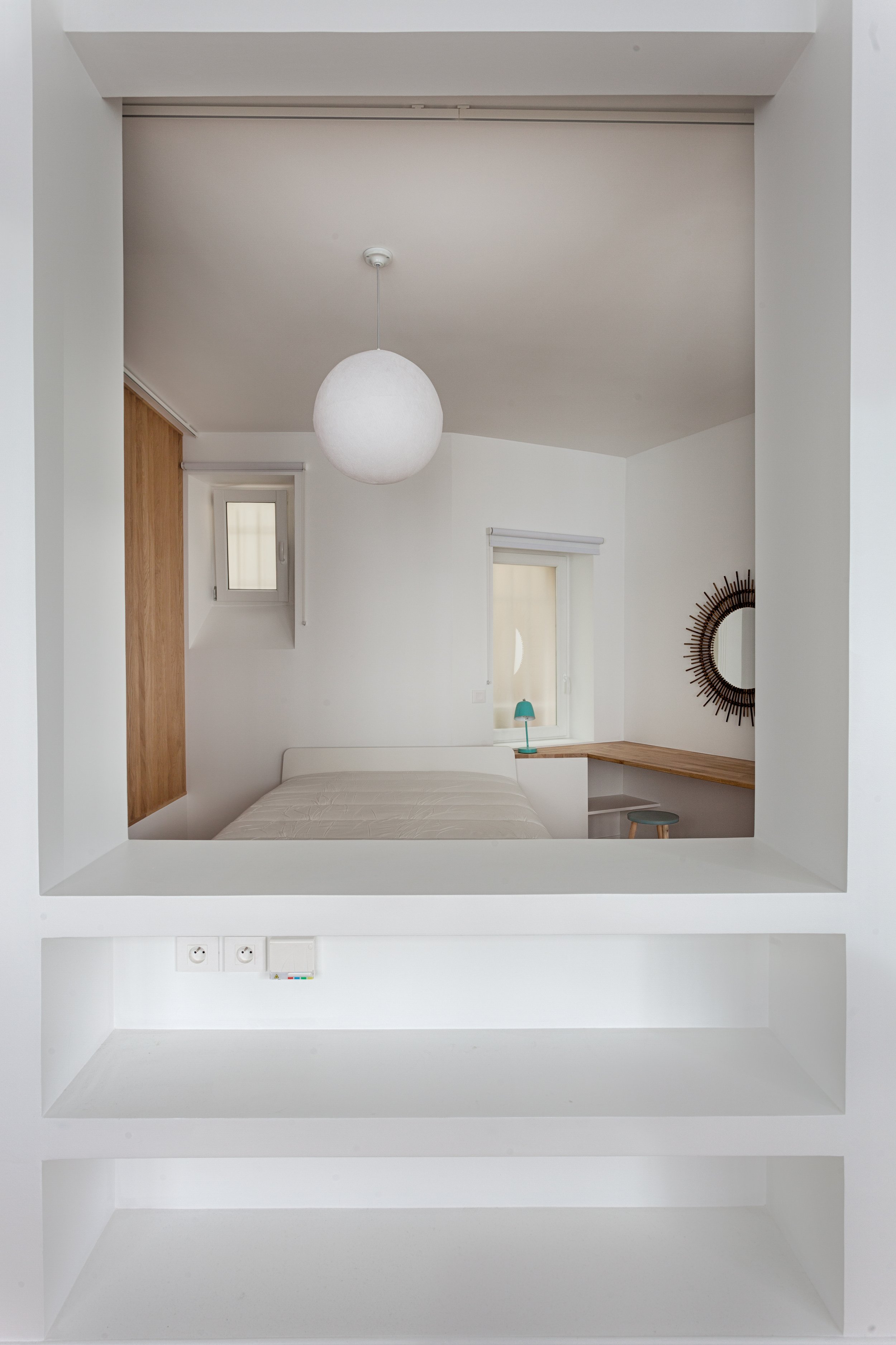 Chambre d'une ancienne boutique transformée en habitation