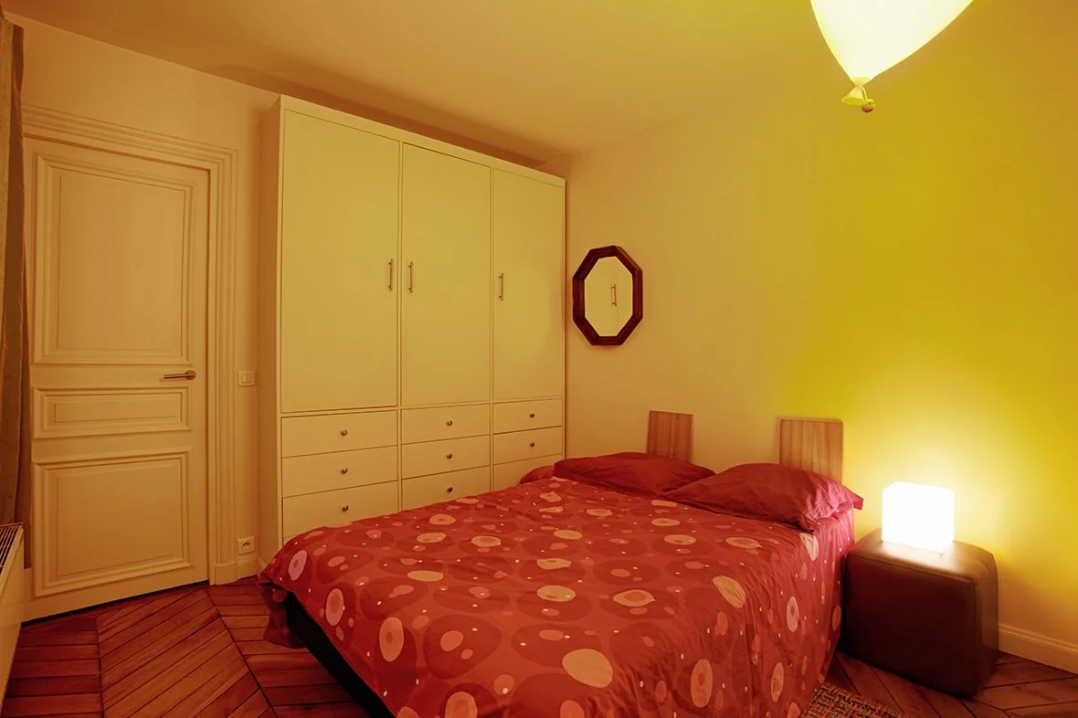 Chambre d'un appartement Haussmannien du 10ème arrondissement  