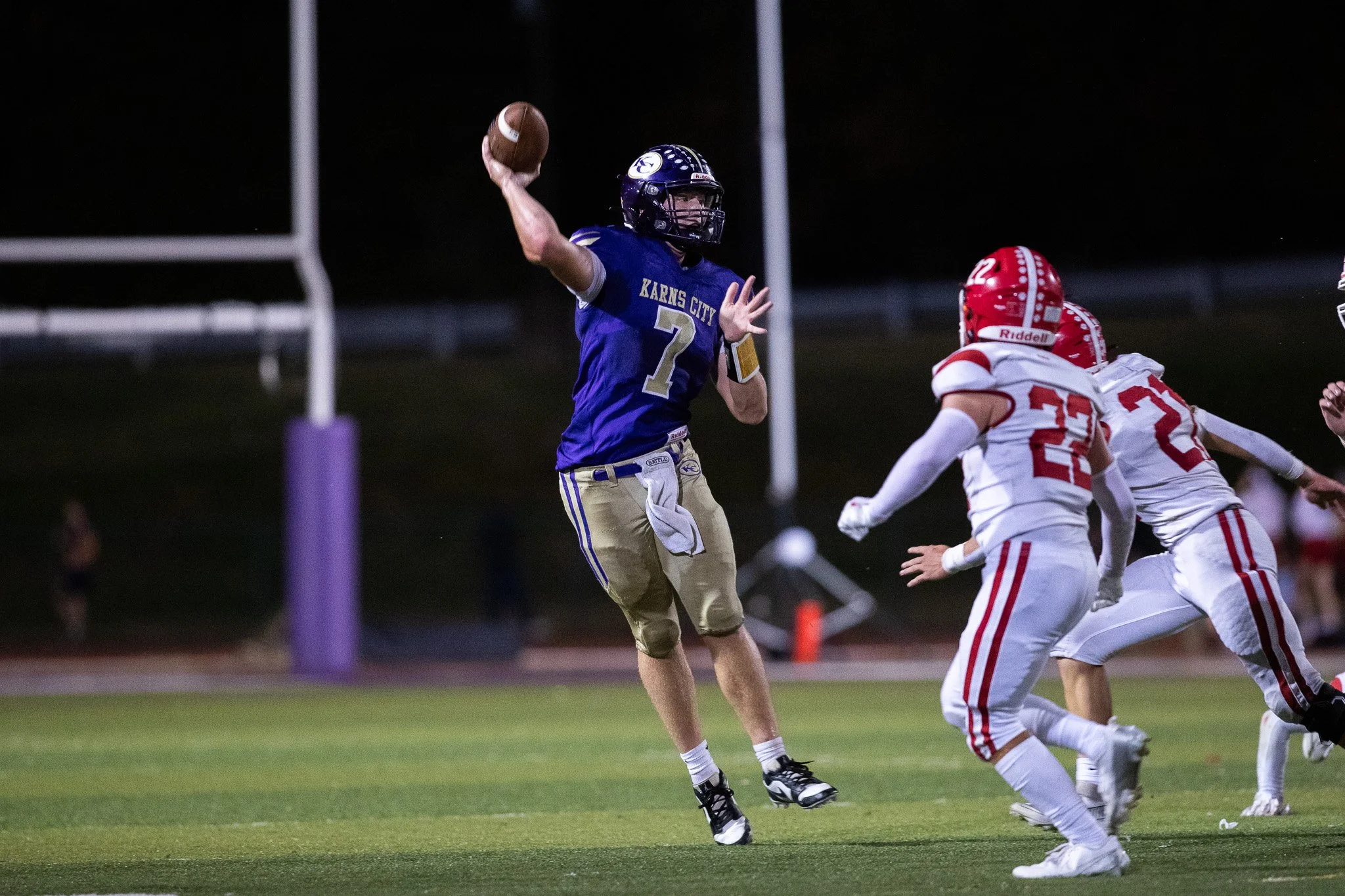 Karns City quarterback throws a pass. 