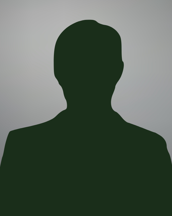 Silhouette of a person with short hair against a gray background.