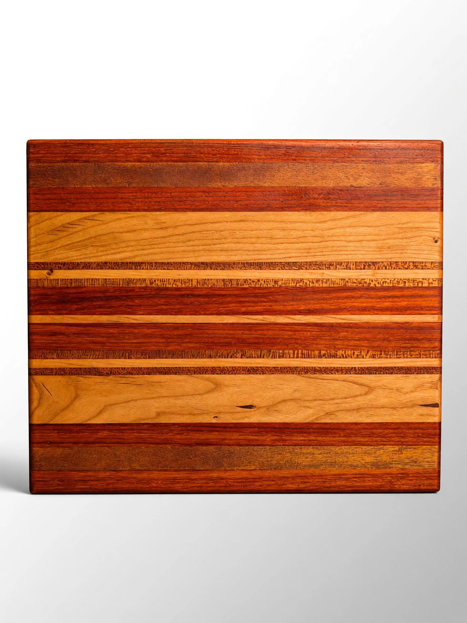 Warm Striped Hardwood Cutting Board