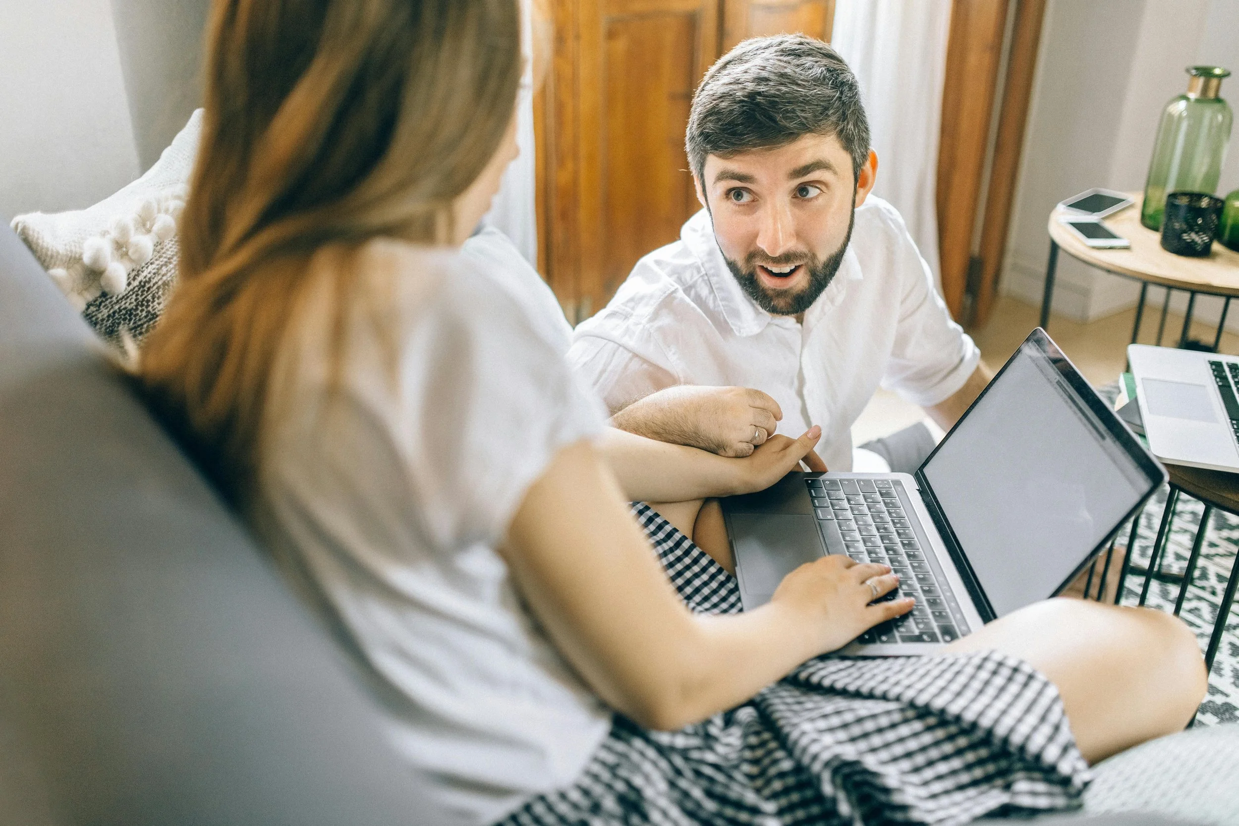Couple in conversation, attention turned toward each other