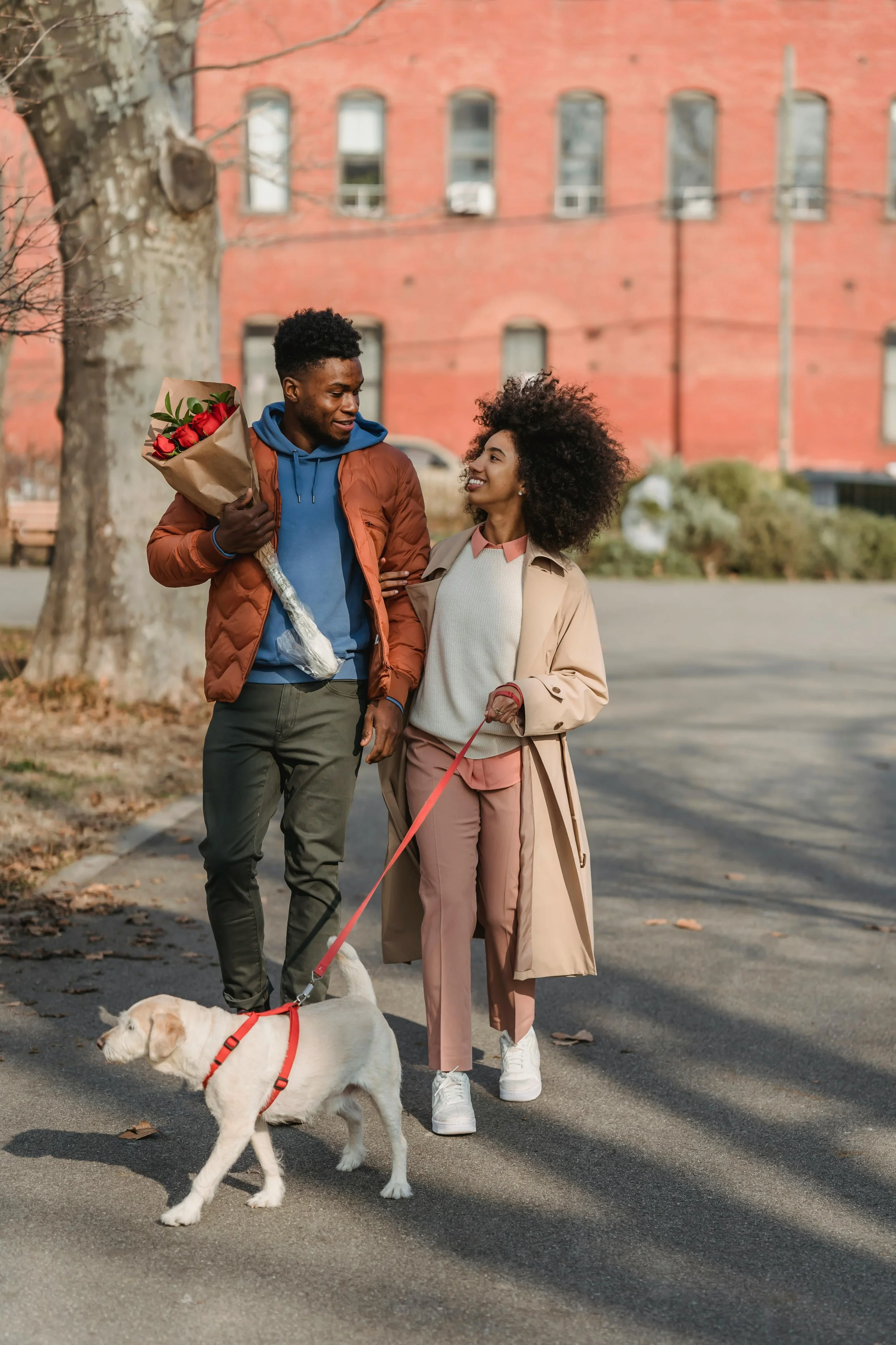 Couple on city street with flowers, relationship and life transitions therapy Rhode Island