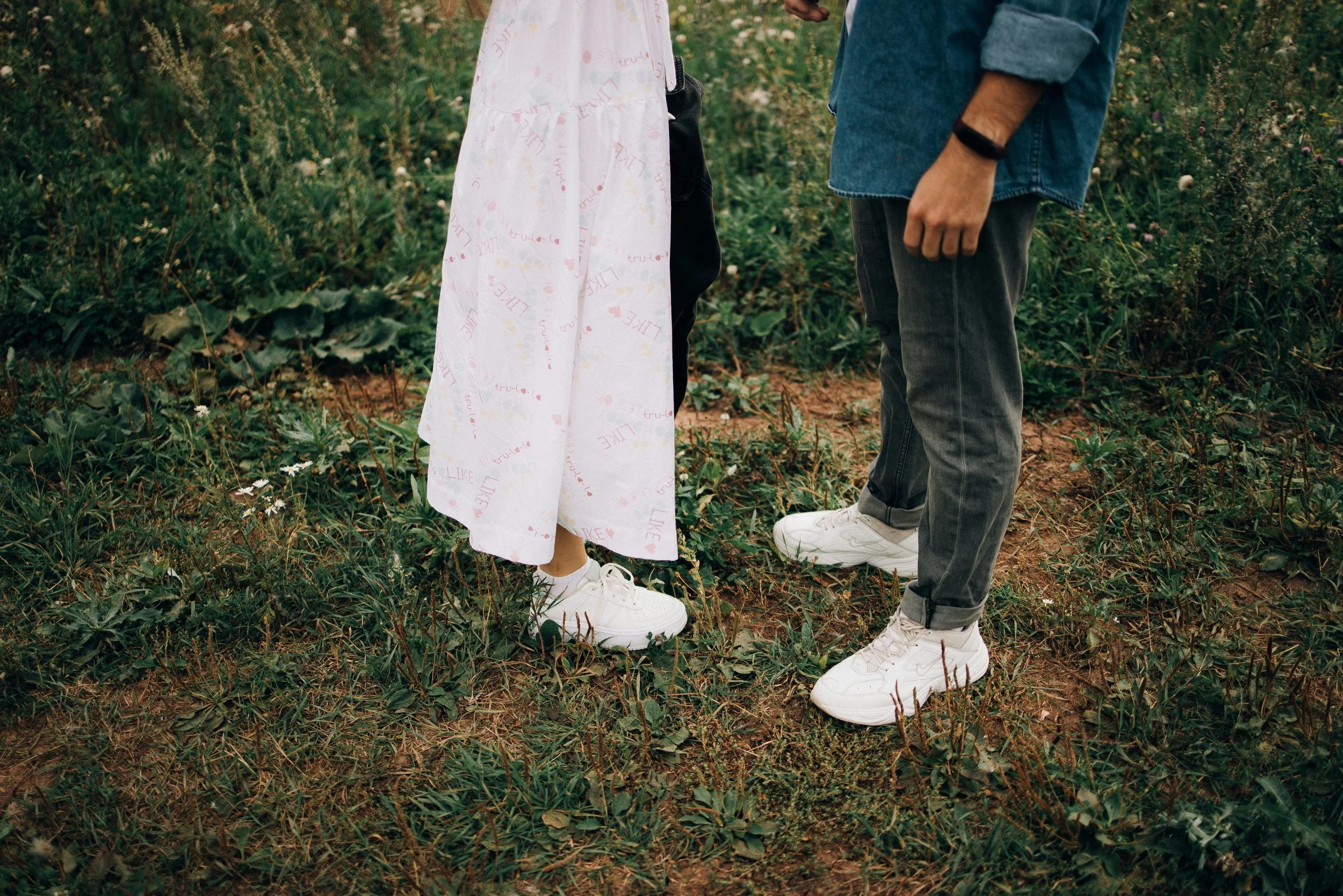 Couple standing apart in nature, conflict and relationship therapy East Greenwich RI
