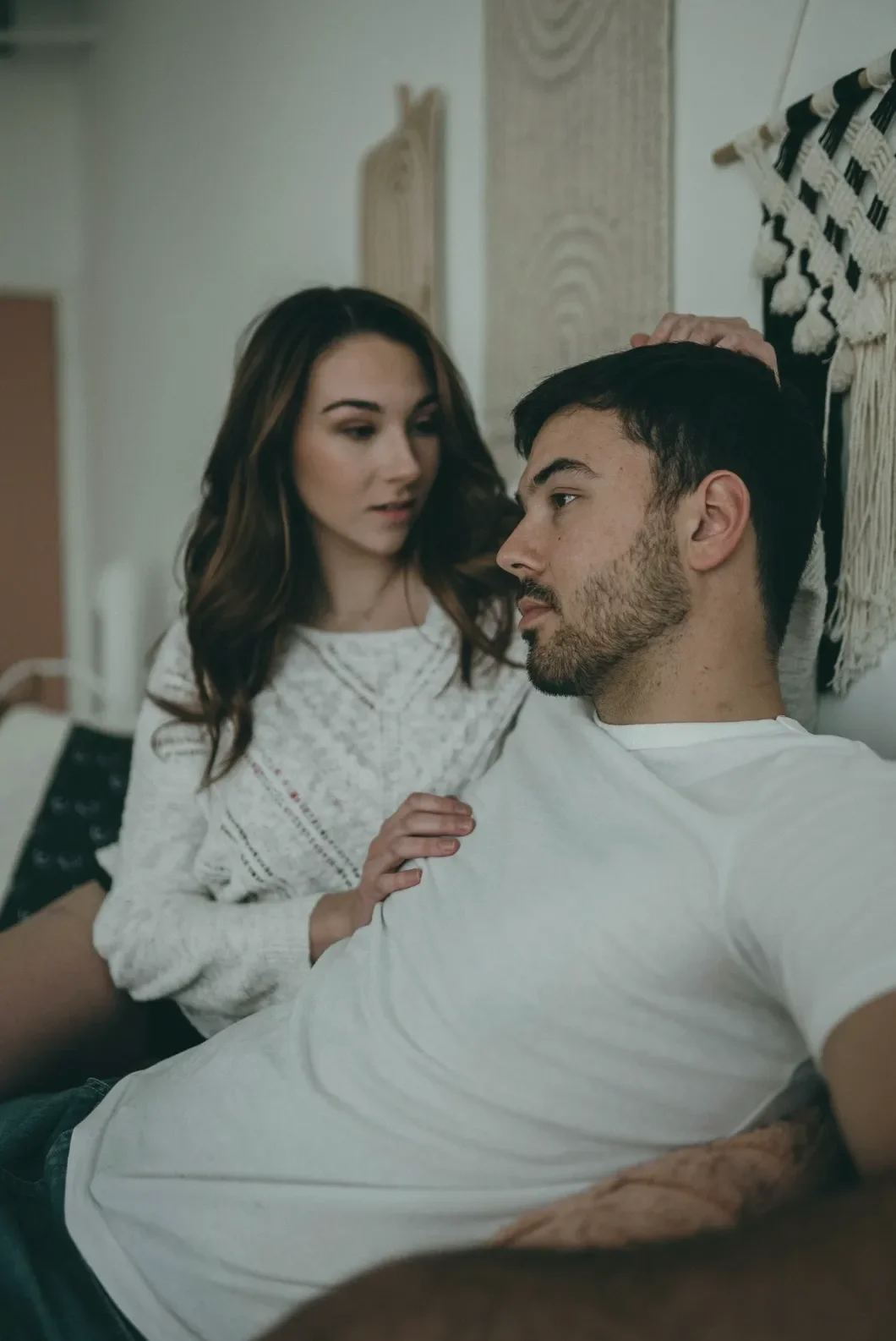 Couple sitting together during a difficult conversation.