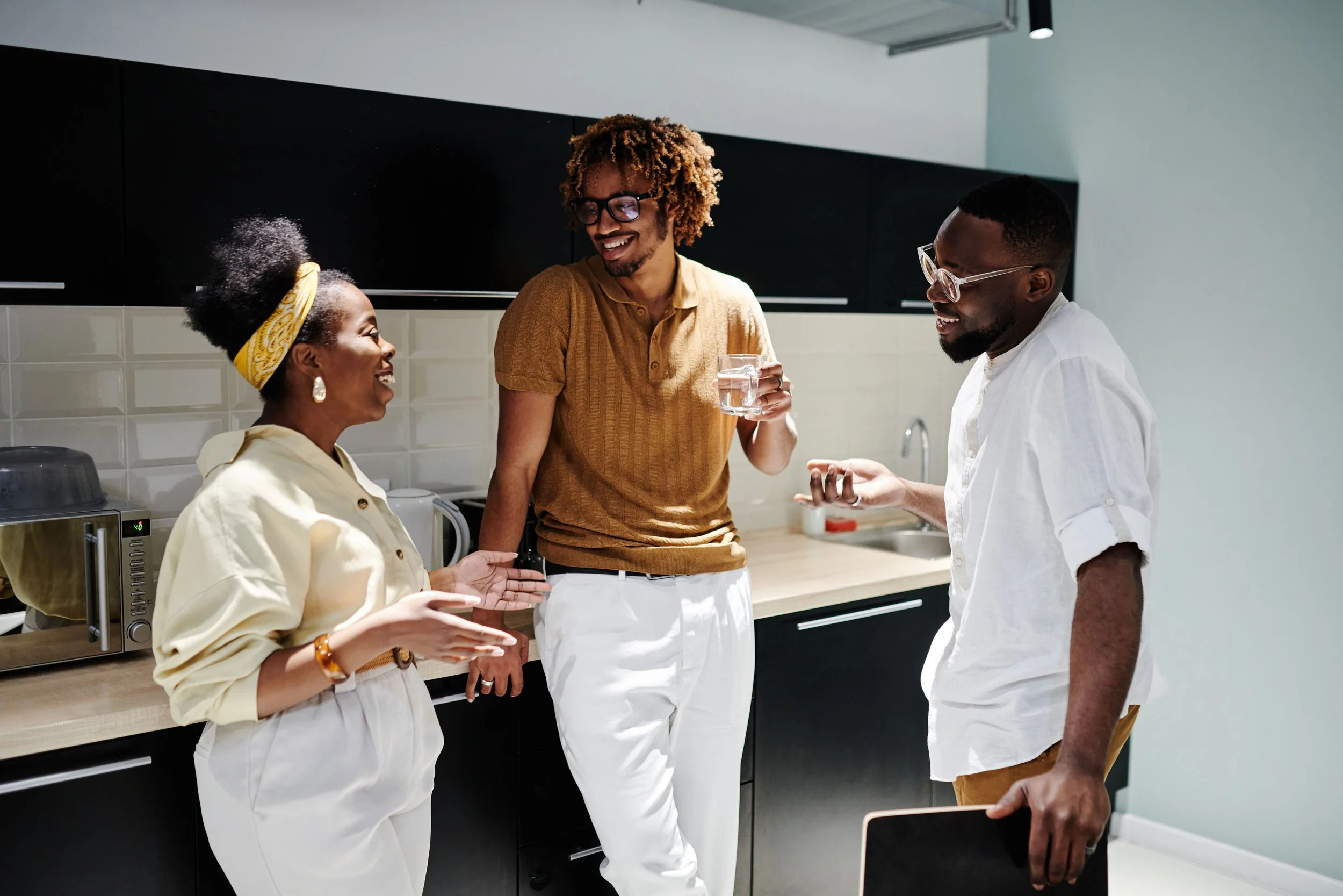 Polyamorous partners communicating openly about time, expectations, and boundaries.