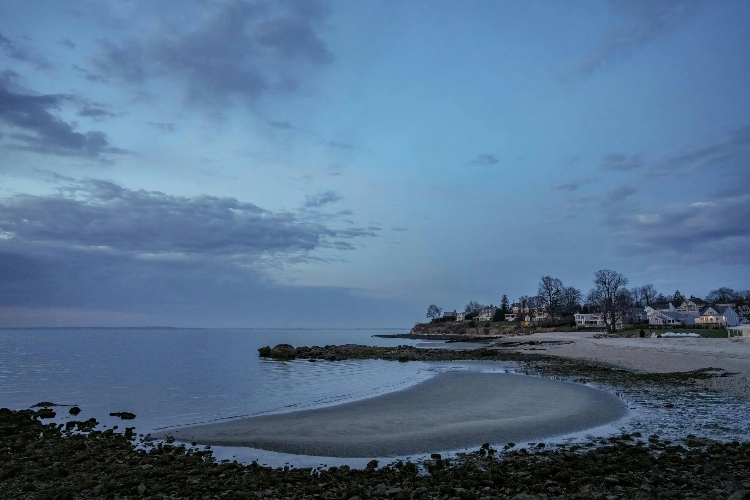 Calm Rhode Island coastline at dusk, East Greenwich therapy practice location
