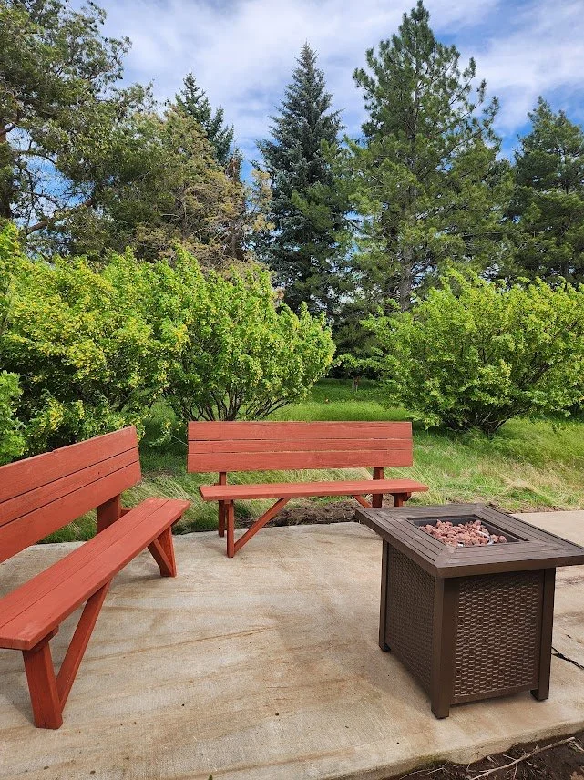 20250510_sunset patio at shepherds camp with firepit.jpg