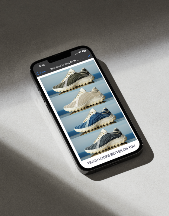 Smartphone displaying images of different sneakers with a caption: 'TRASH LOOKS BETTER ON YOU'.