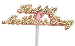 A decorative cake or cupcake pick reading 'Happy Mothers Day' in pink and gold lettering on a stick.