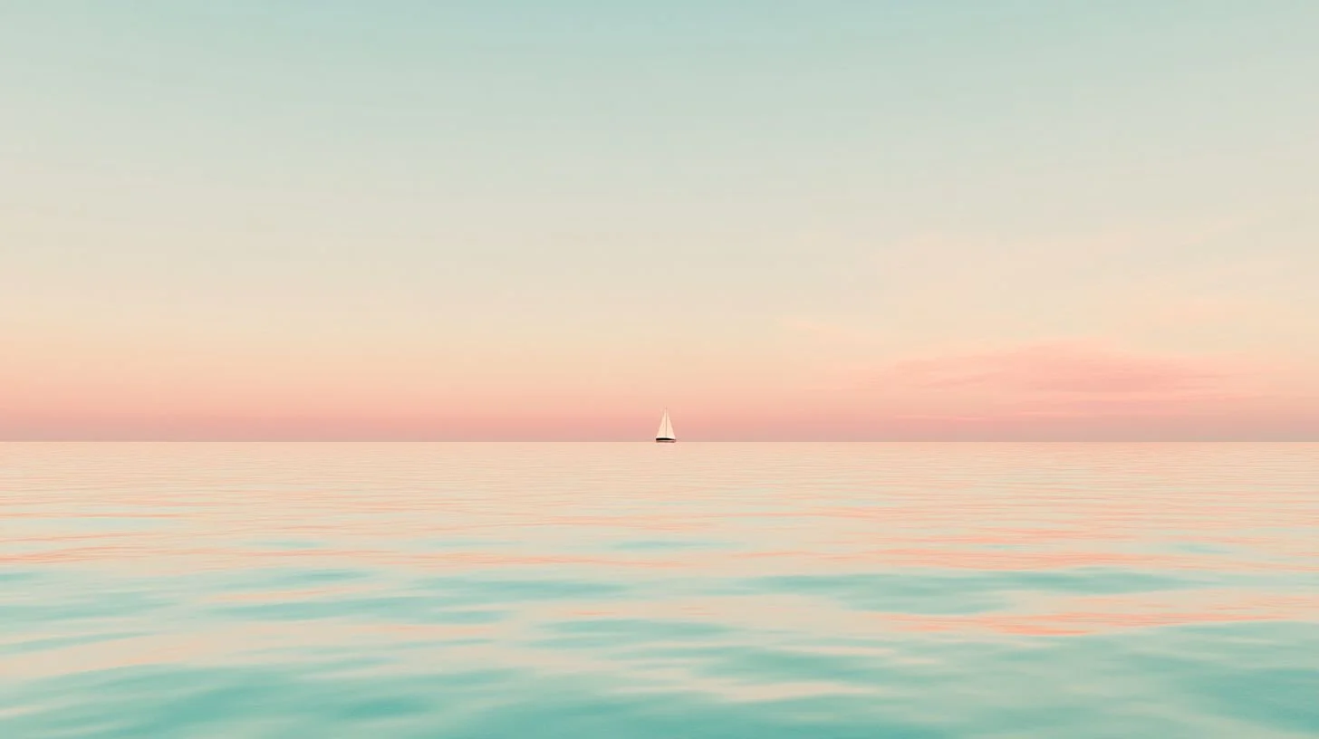 Calm ocean with pastel pink and blue sky and a small sailboat on the horizon.