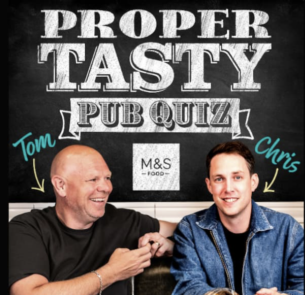 Two men, labeled Tom and Chris, smiling and shaking hands, sitting in front of a chalkboard sign that reads 'Proper Tasty Pub Quiz' with the M&S Food logo.