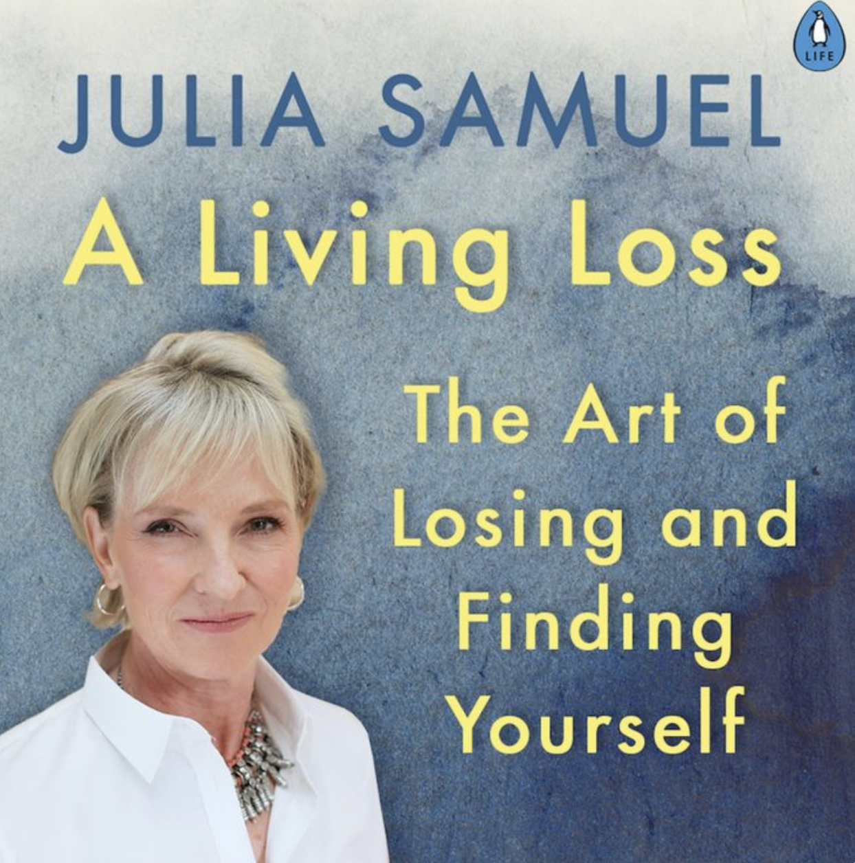 Book cover with a portrait of Julia Samuel, blue background, title 'A Living Loss: The Art of Losing and Finding Yourself,' and a Penguin Life logo in top right corner.