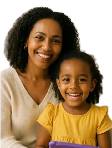 A smiling woman and a young girl smiling, with the woman having curly hair and the girl wearing a yellow dress, in a close-up portrait.
