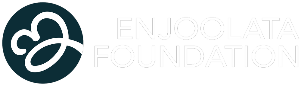 Enjolata Foundation logo featuring a stylized butterfly icon and text