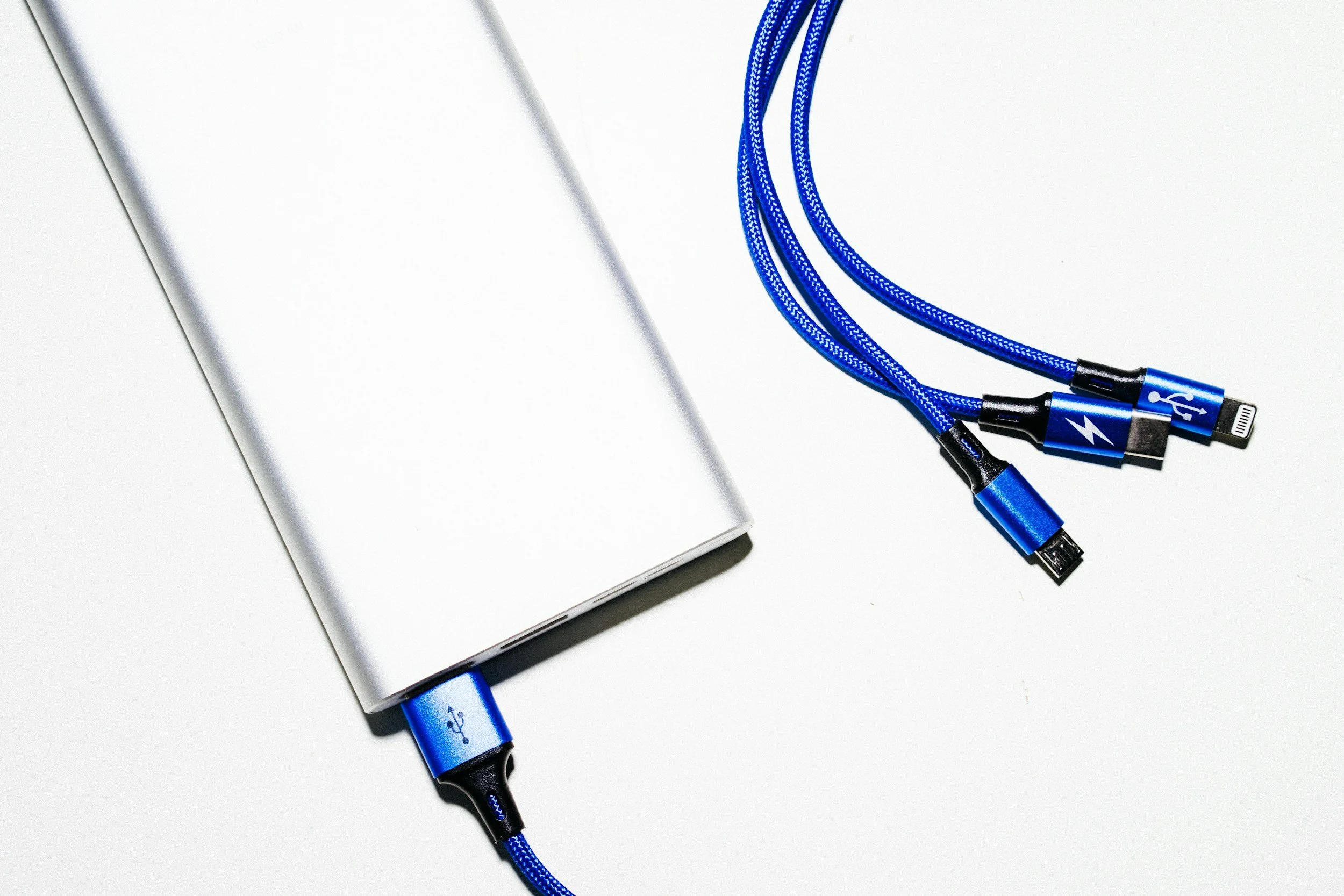 Slim power bank charging a phone