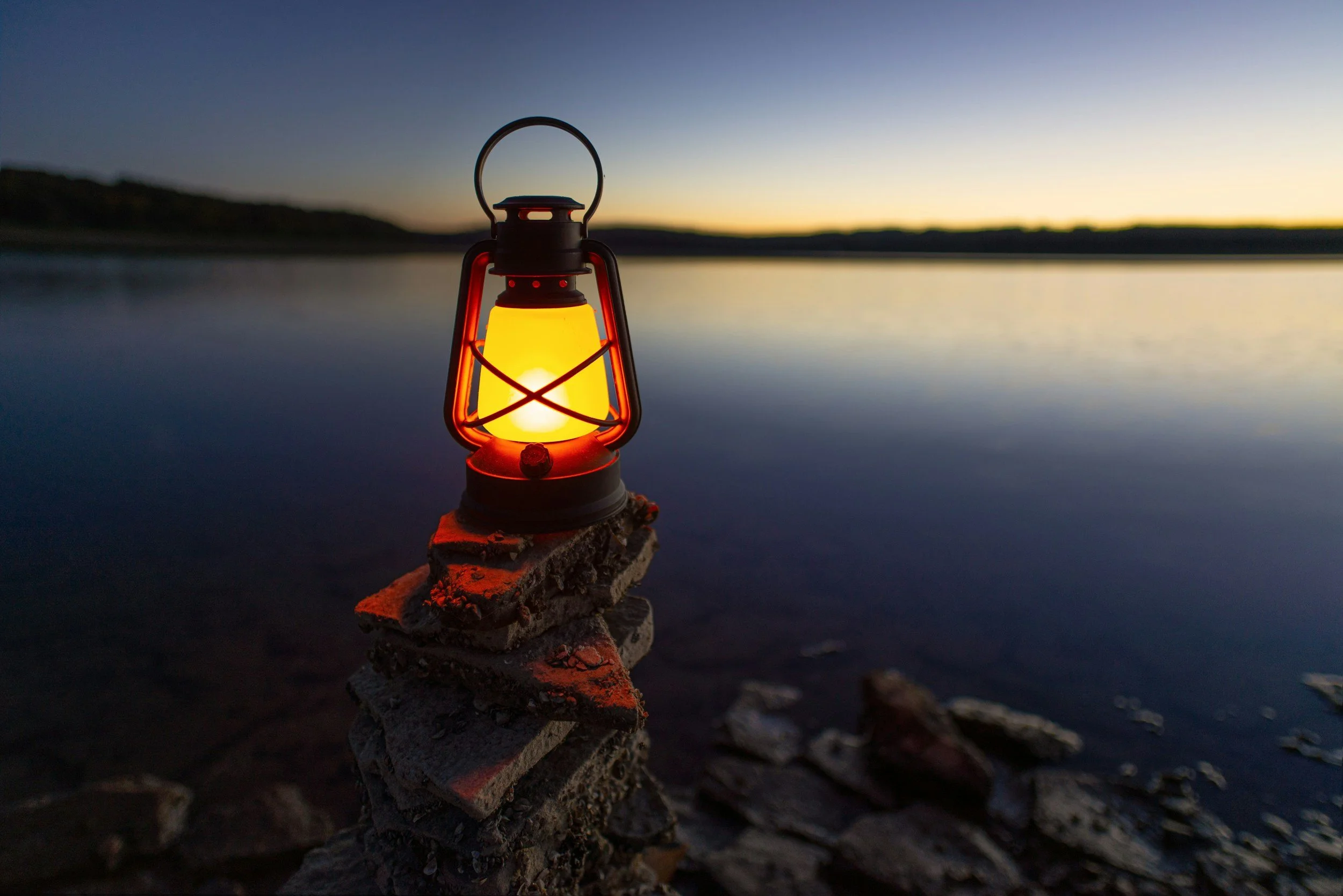 Rechargeable LED lantern lighting a cosy room in a power cut