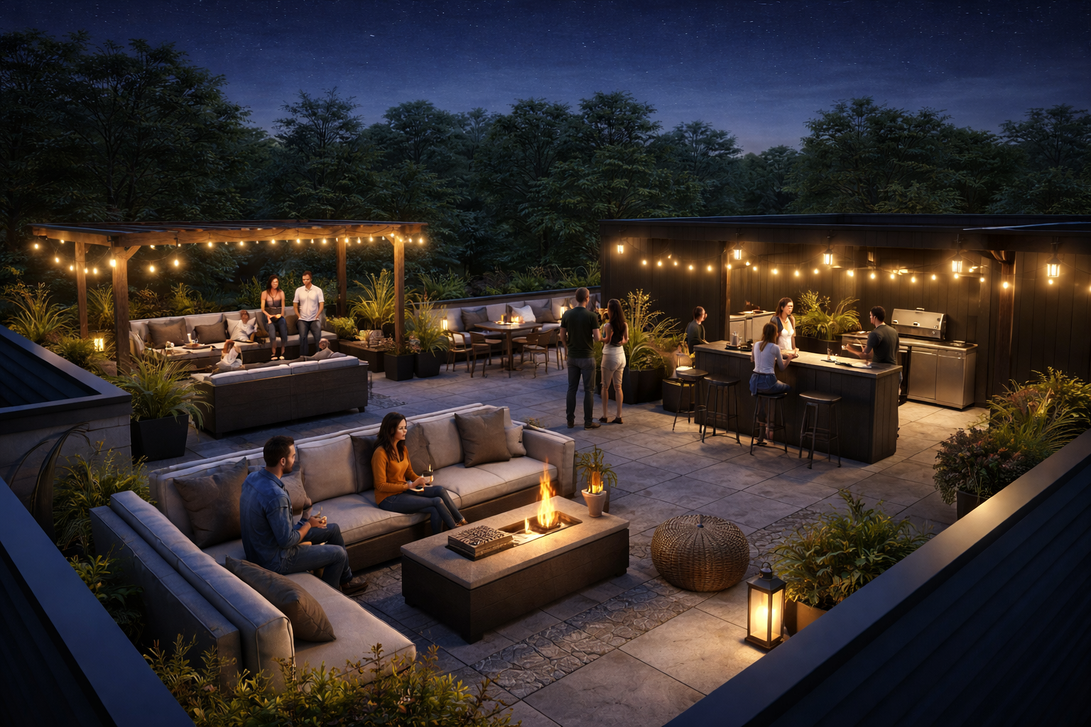 A group of people enjoying an evening on a decorated outdoor rooftop patio with string lights, a fire pit, and a bar area, surrounded by trees under a starry sky.