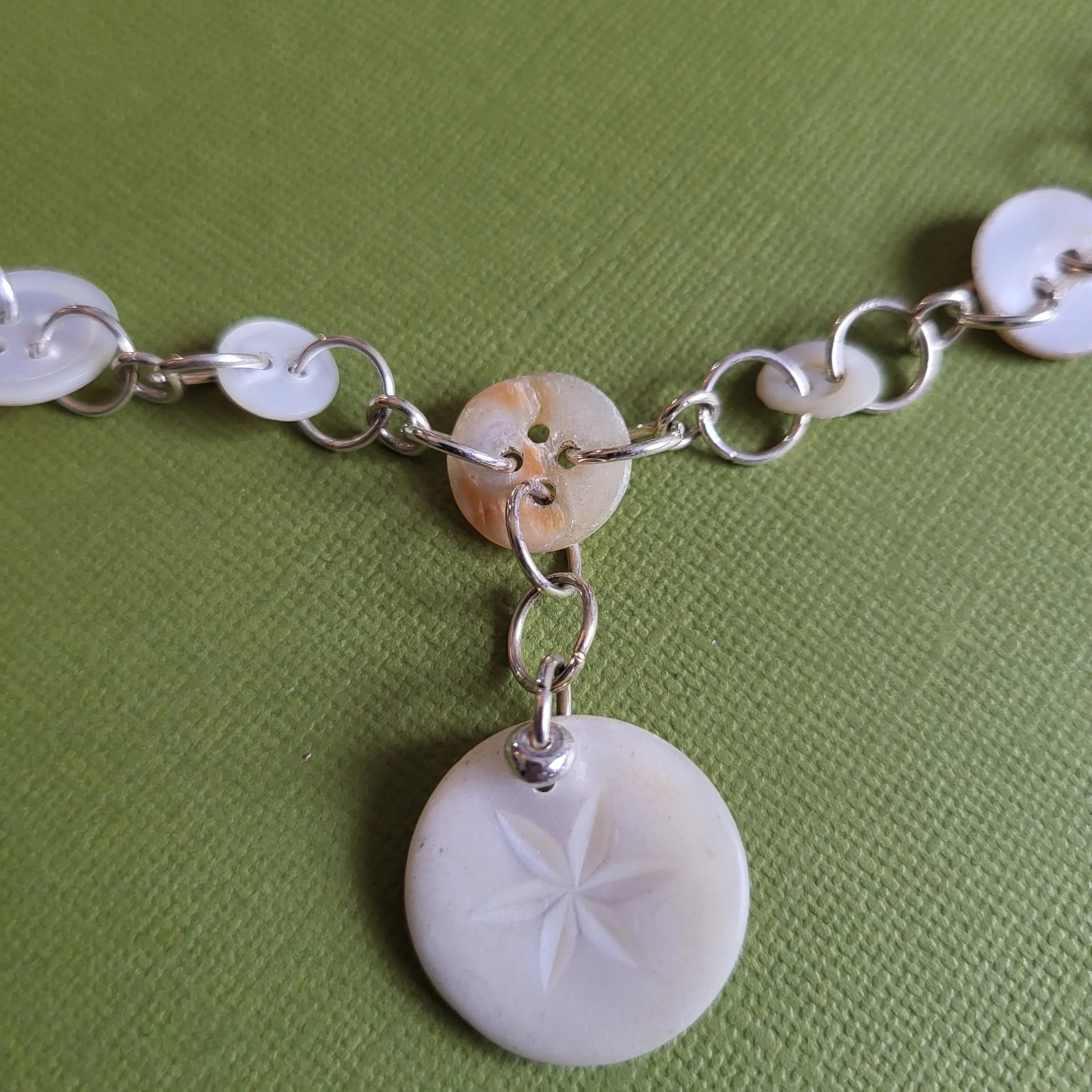 necklace-carved button chain-details-a.jpg