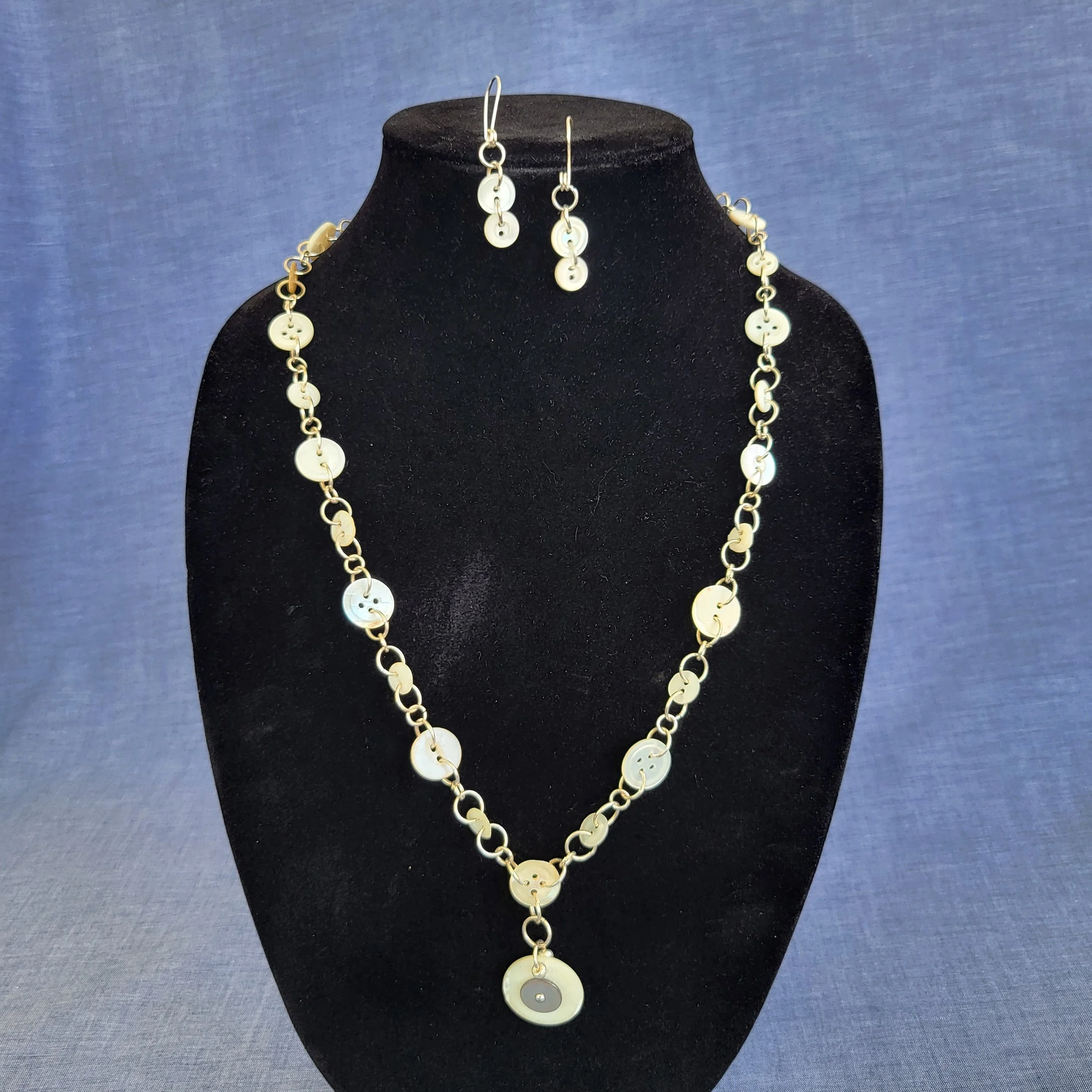 Carved button chain dark-form.jpg