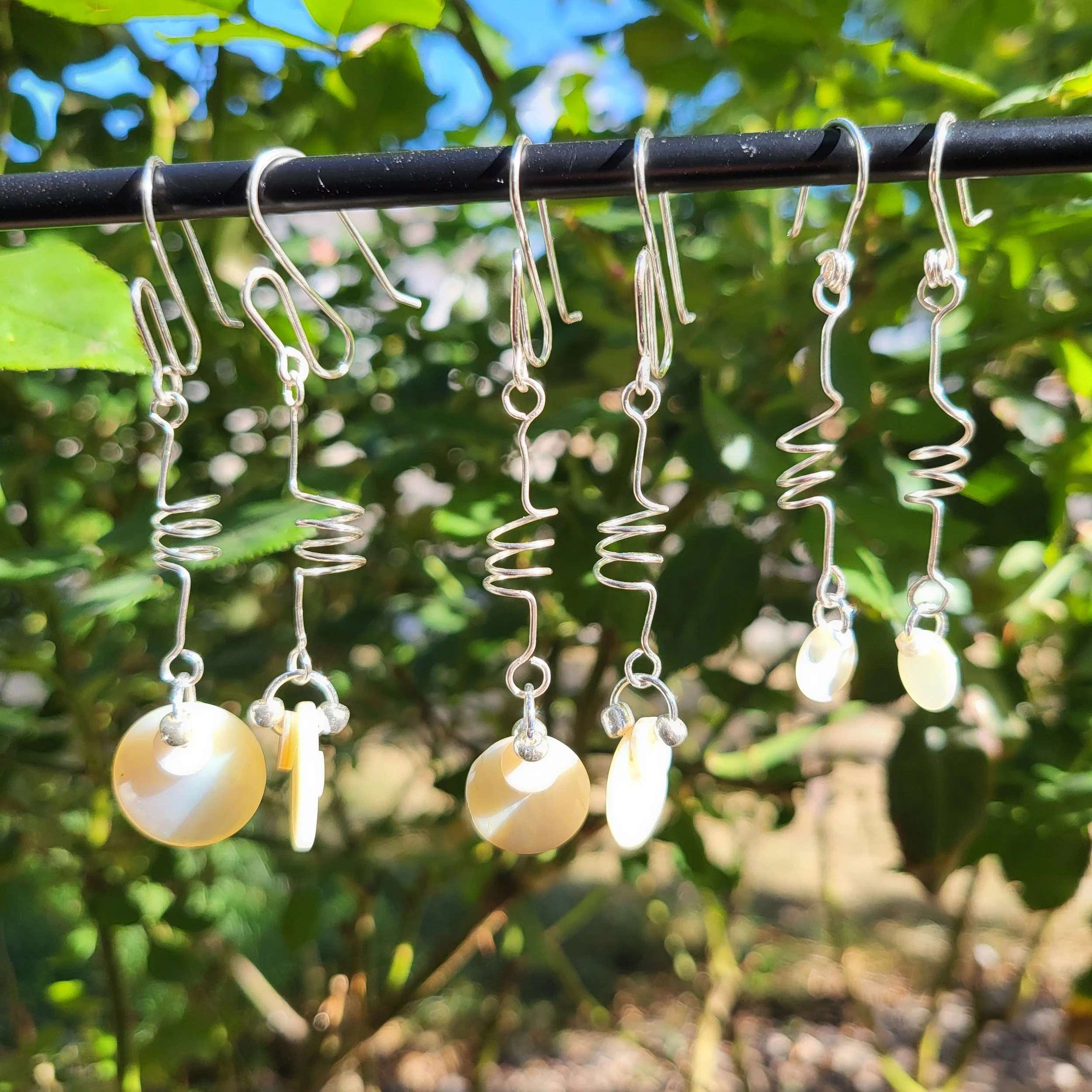 earrings-swirly disks-outside.jpg