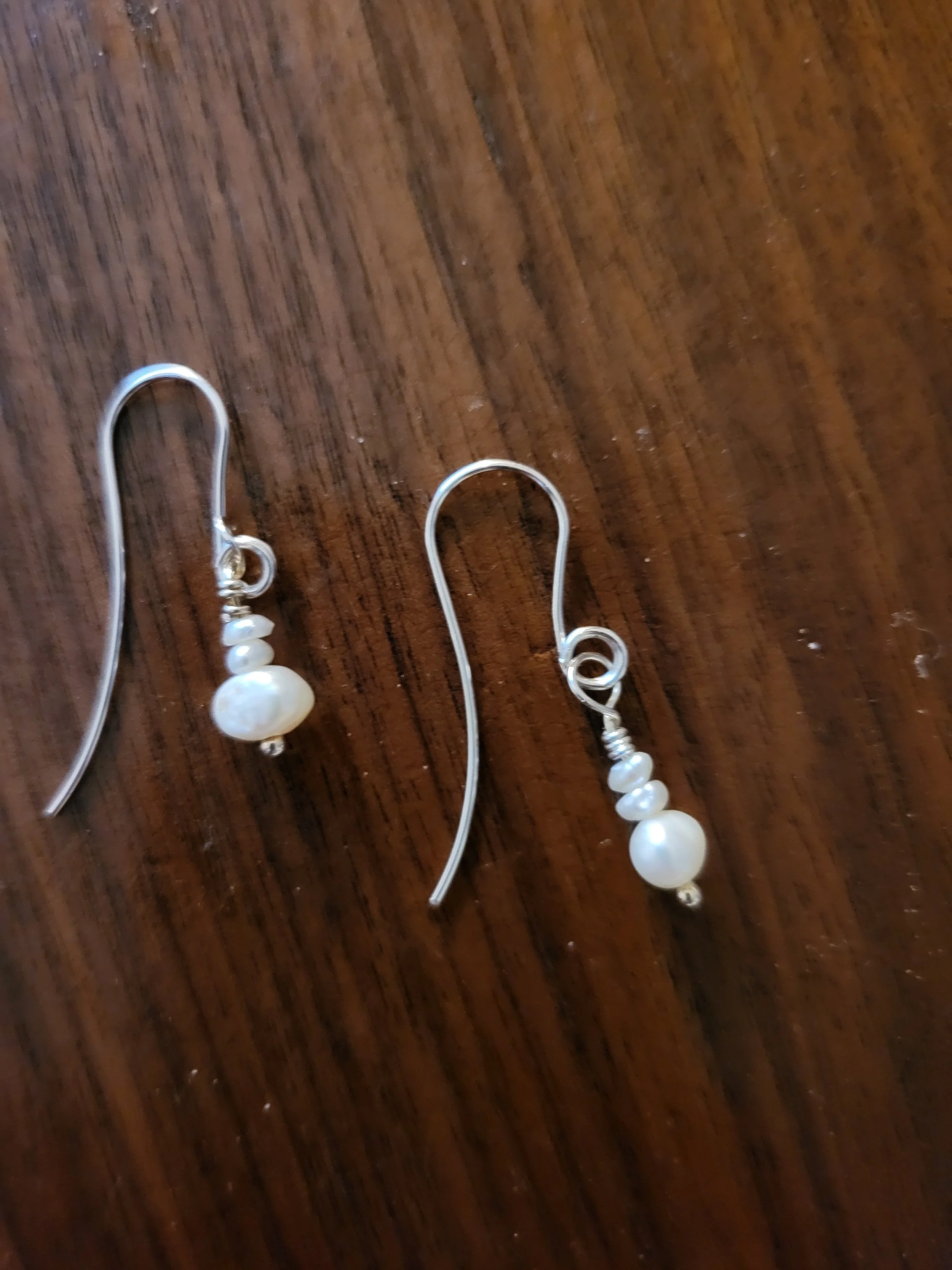 Tiny three pearl dangle earrings.jpg