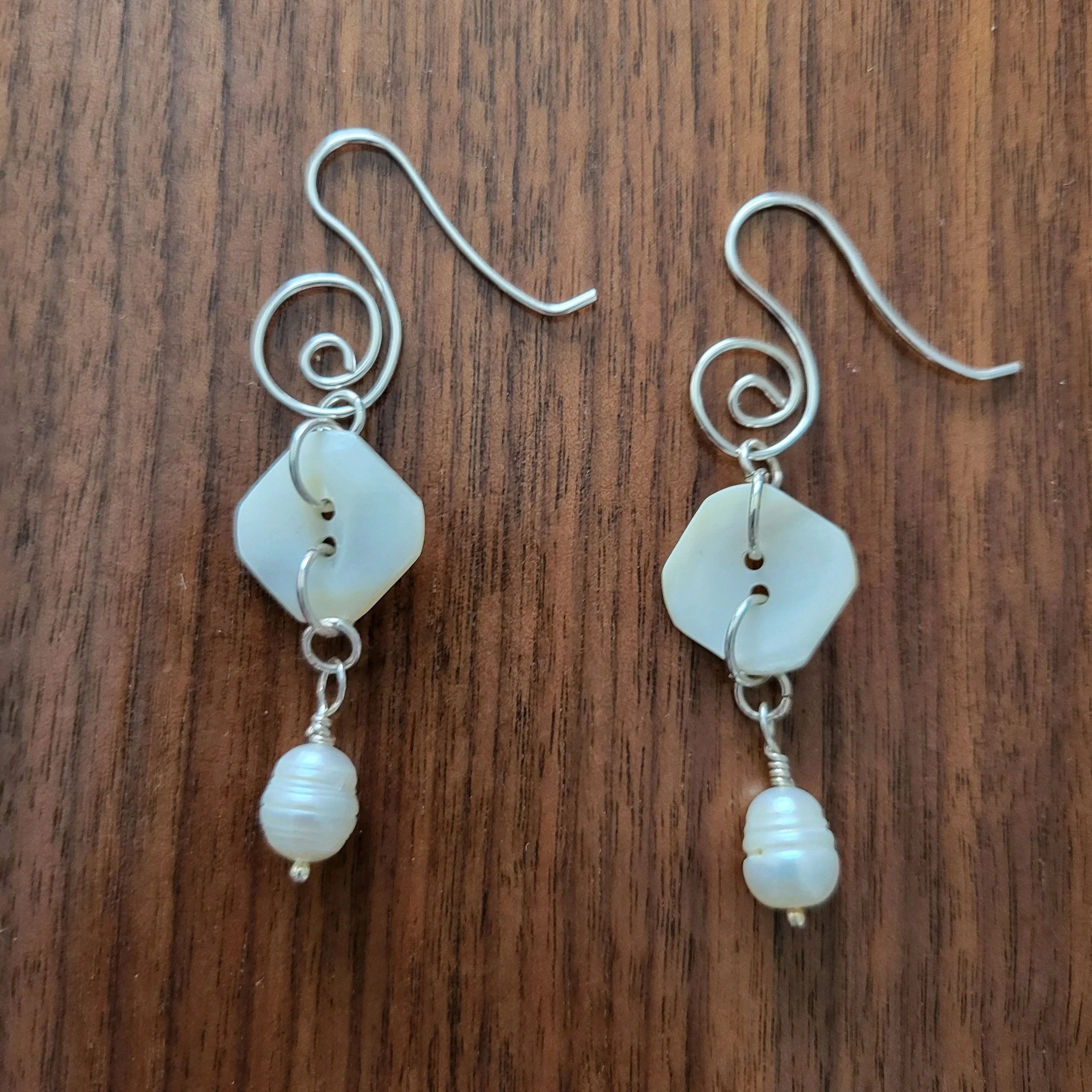 Lg carved square with pearl-inside.jpg