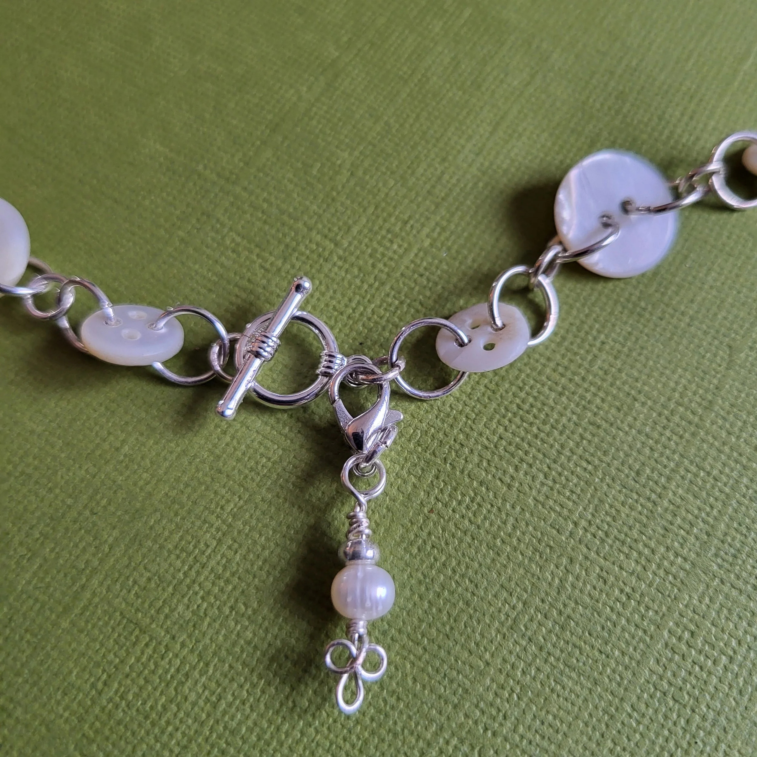 necklace-carved button chain-details-d.jpg