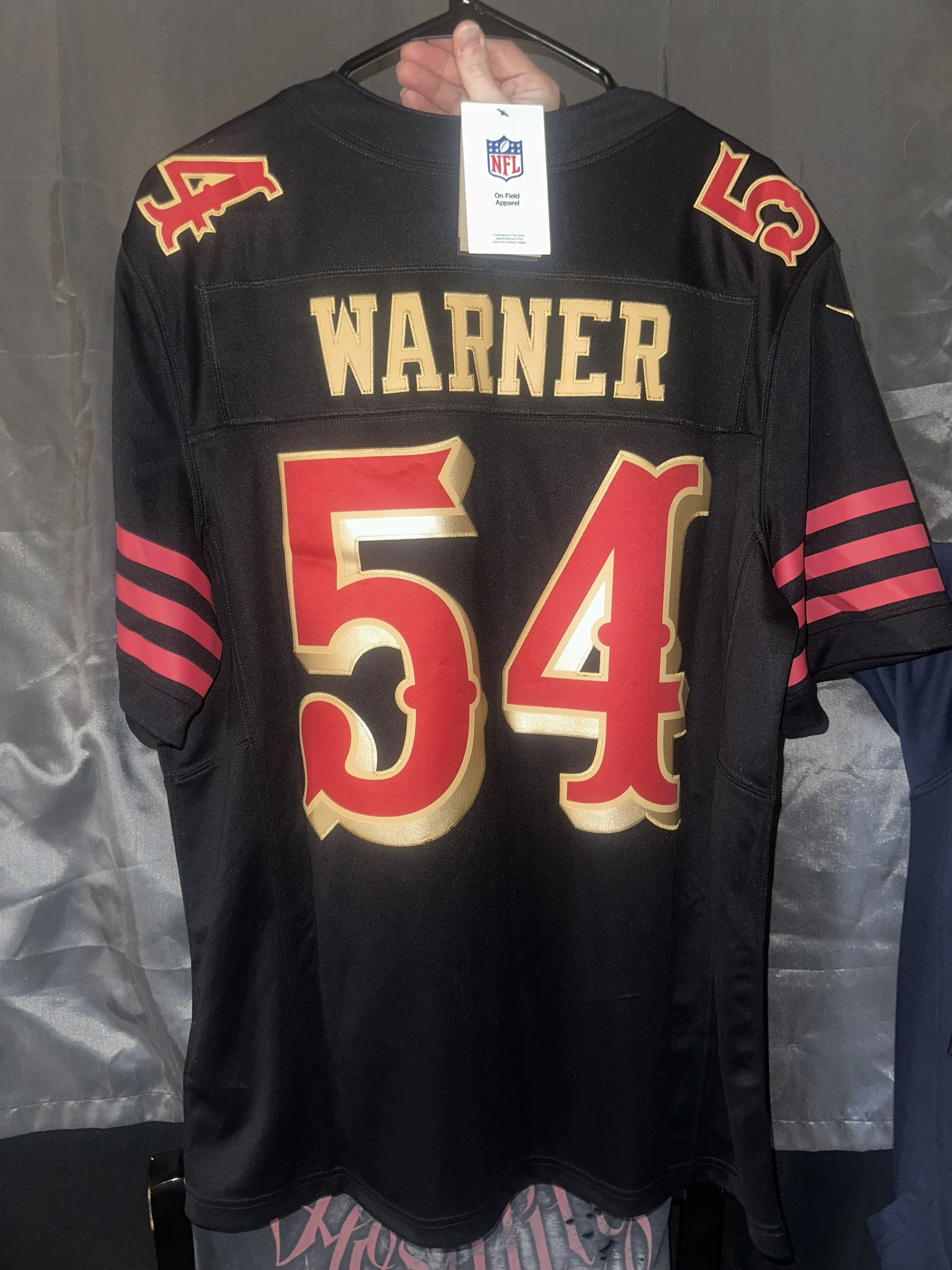 Official NFL Warner #54 Jersey Large
