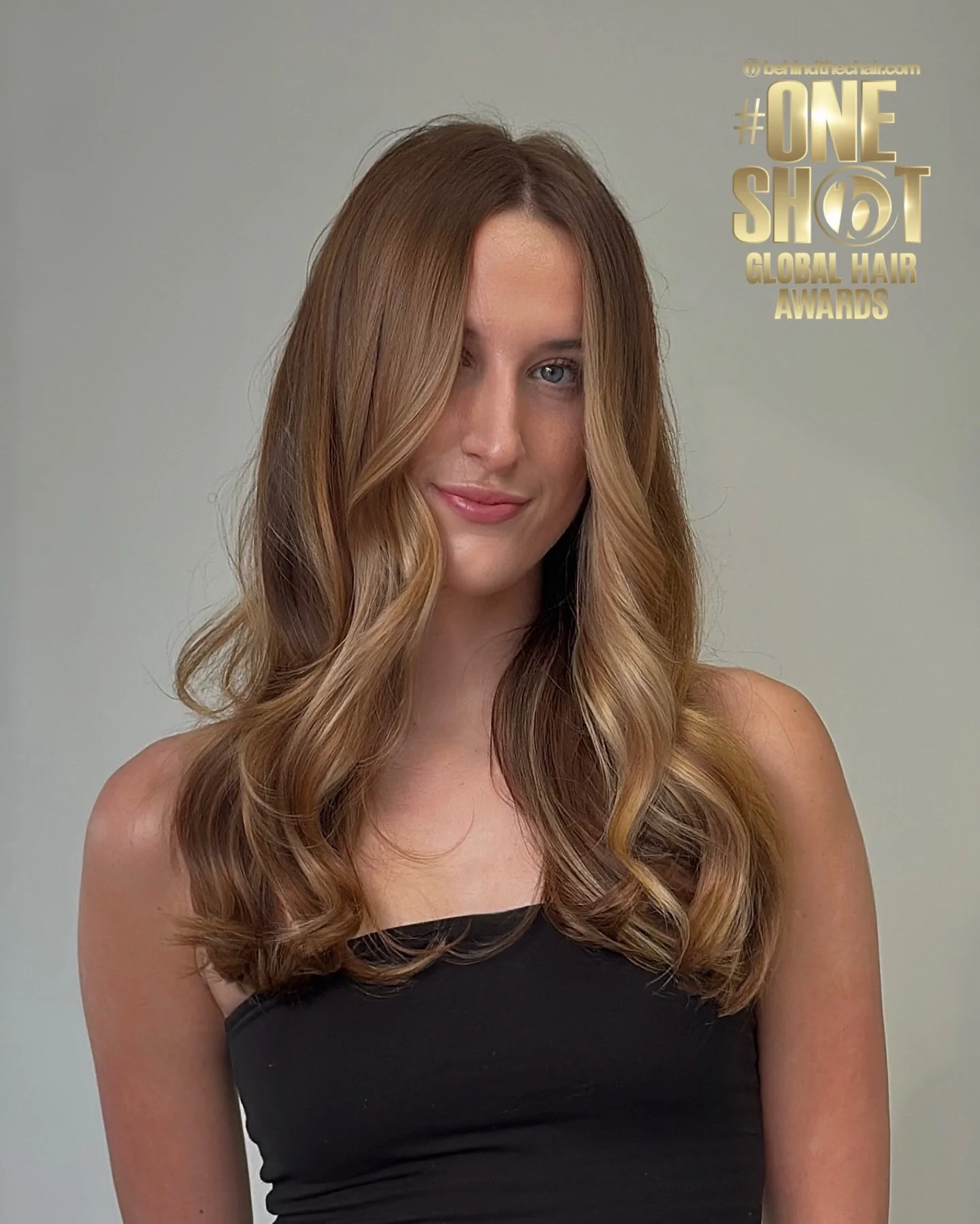 Sunveil
A warm balayage built through softness, not contrast. 
Hand-painted to enhance her natural base, creating a warm blonde that reflects soft, sunlit dimension with a seamless transition from depth to light.

Balanced, refined, and effortlessly 