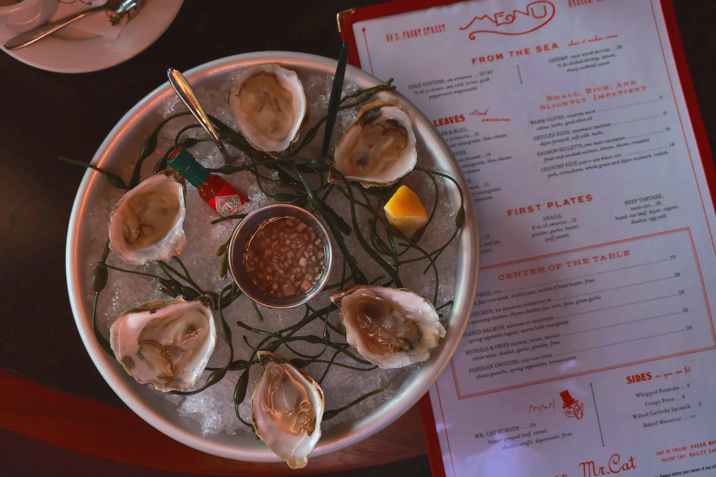Half dozen oysters served at French brasserie Mr. Cat in Hudson New York