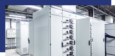 Large industrial electrical control panel in a manufacturing facility