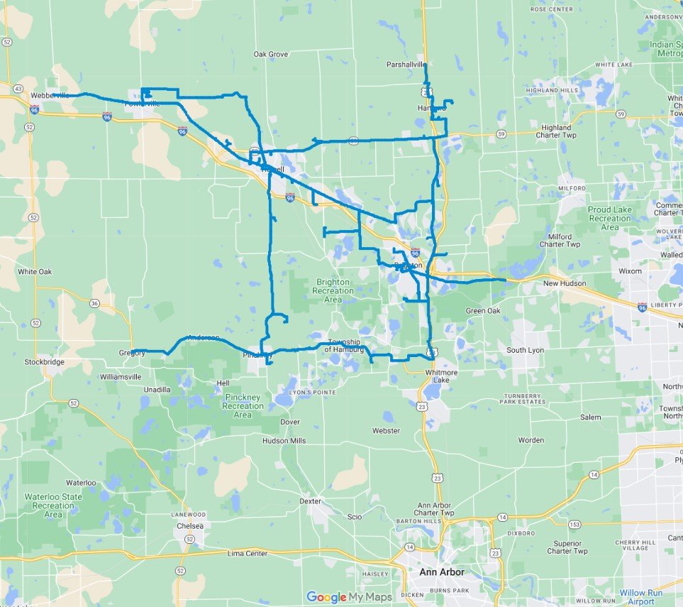 Map showing a route on public transportation in the area around Ann Arbor, Michigan, with various lines and stops marked.