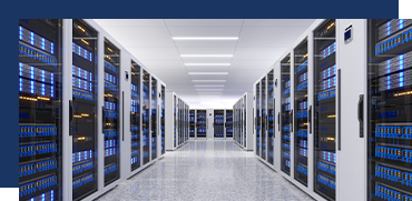 Data center with rows of server racks and bright overhead lighting.