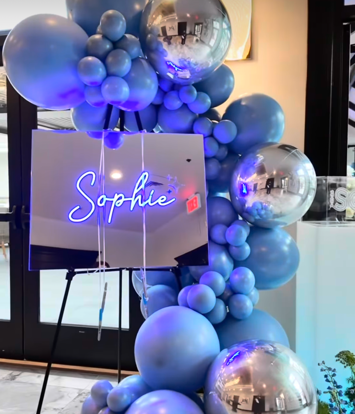 Mirrored sign in board_Blue neon_Script_Bat.png