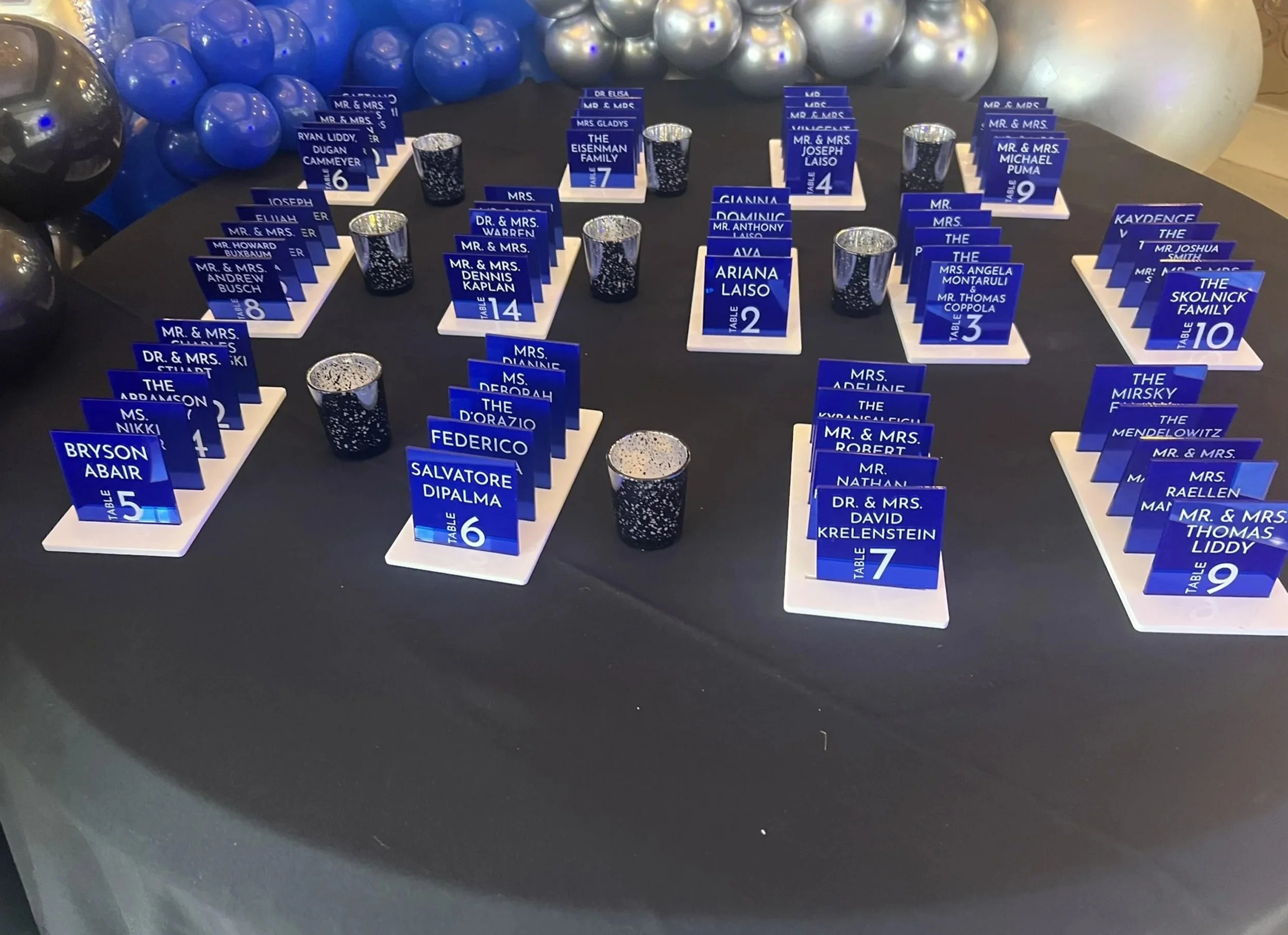 Blue custom acrylic escort cards. 