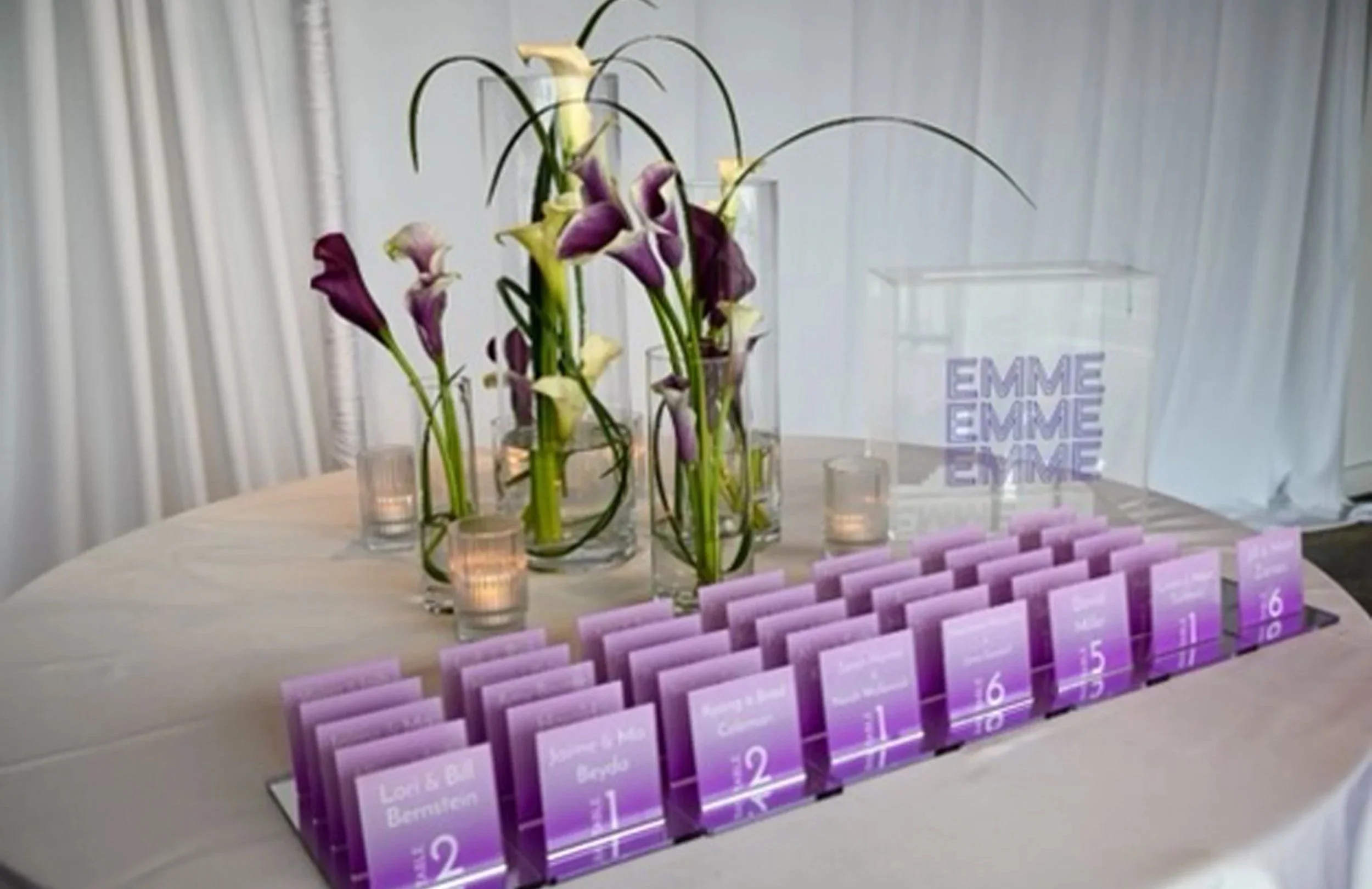 Custom purple gradient escort cards. 