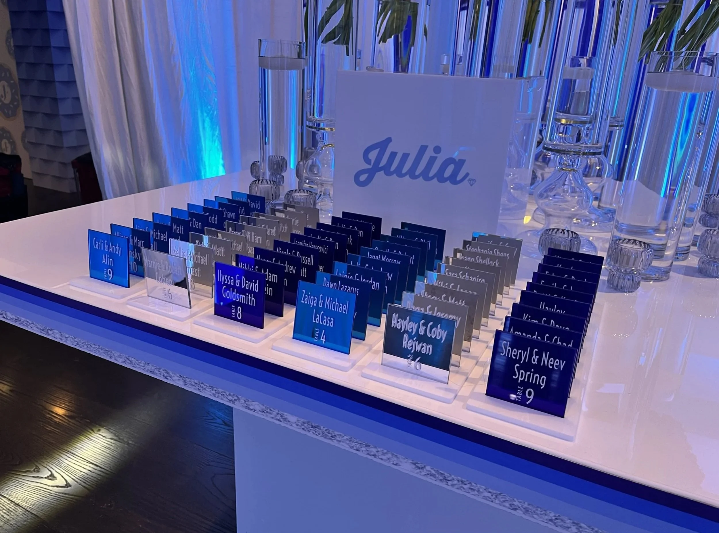 Custom blue mirror escort cards. 