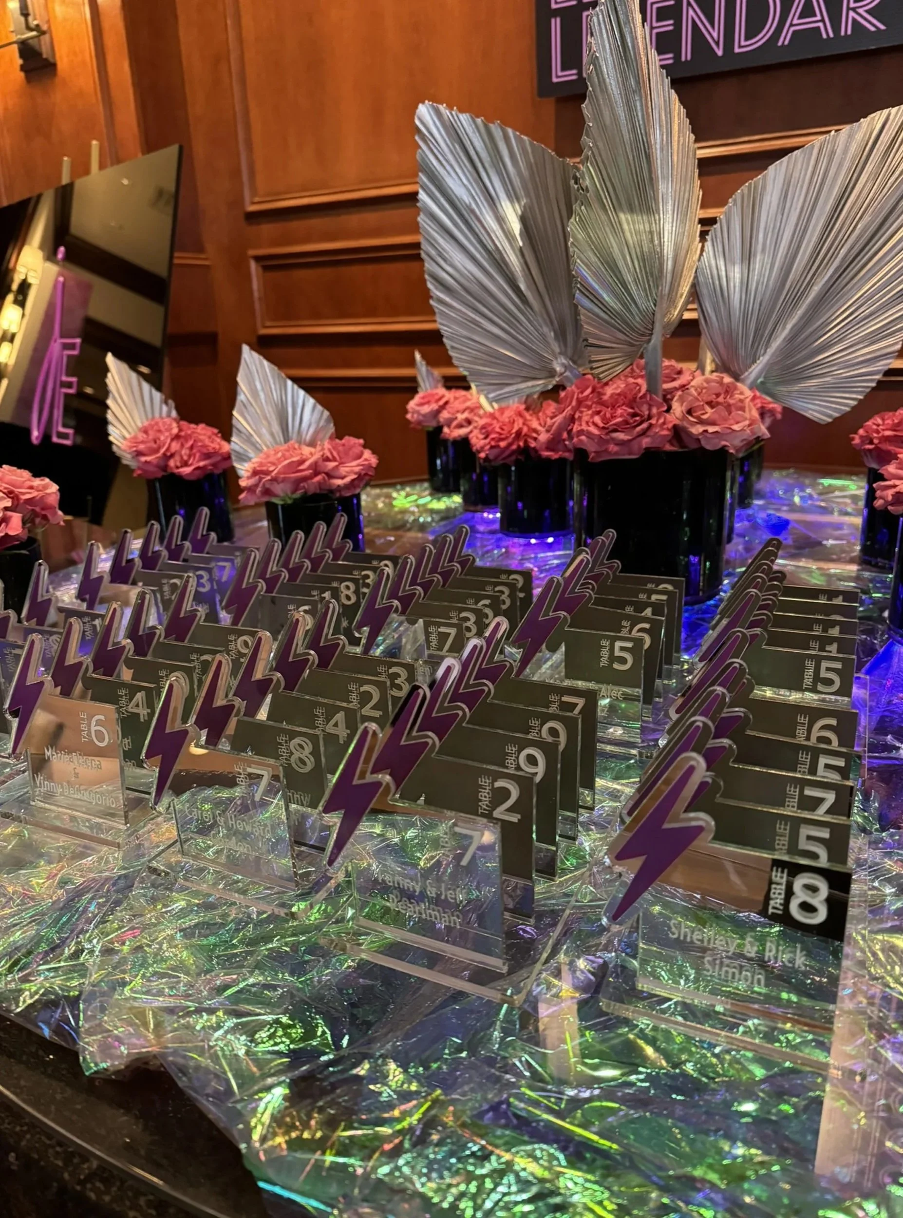 Custom mirrored acrylic escort cards with lightning bolt. 