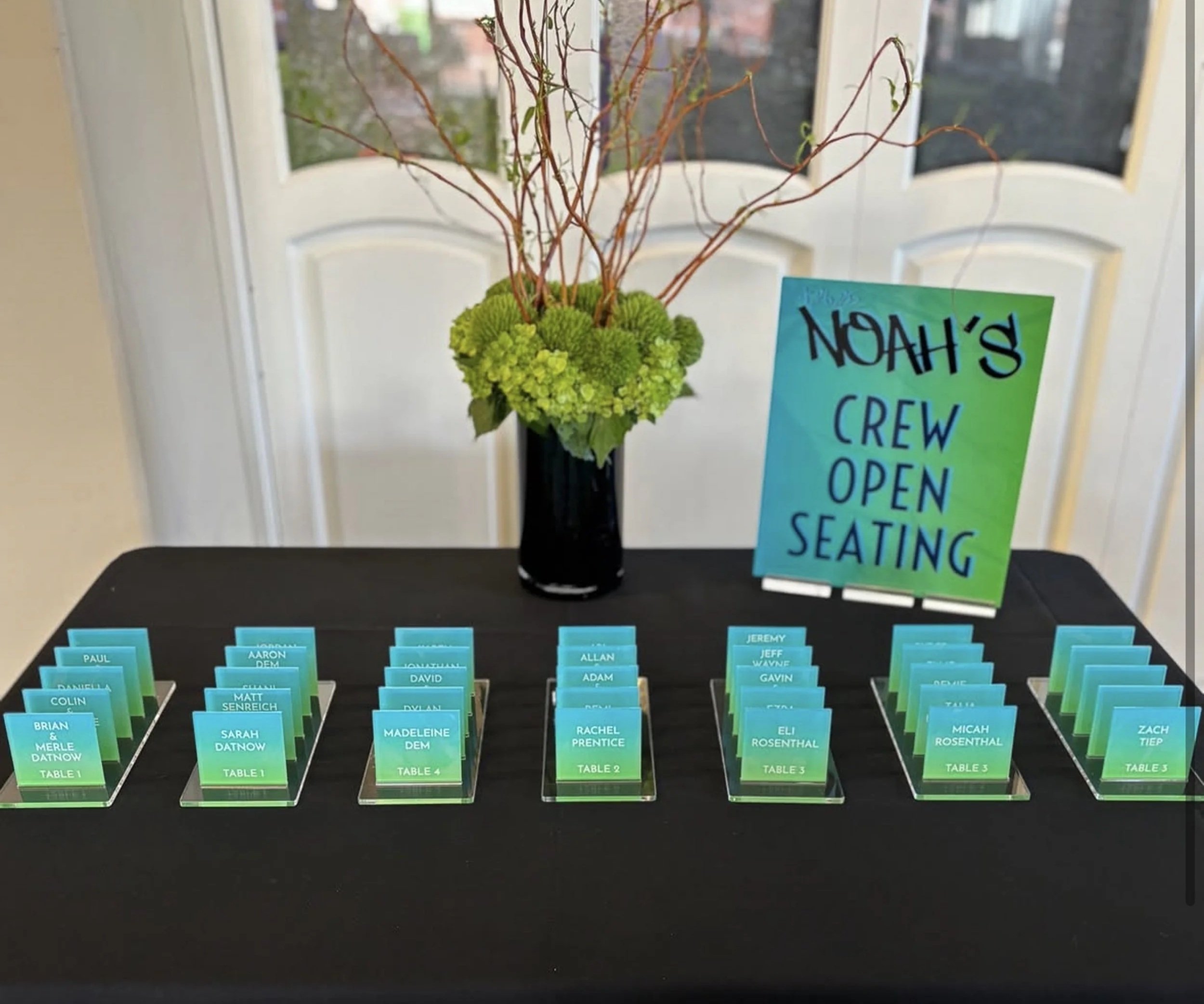 Custom blue and green gradient escort cards. 