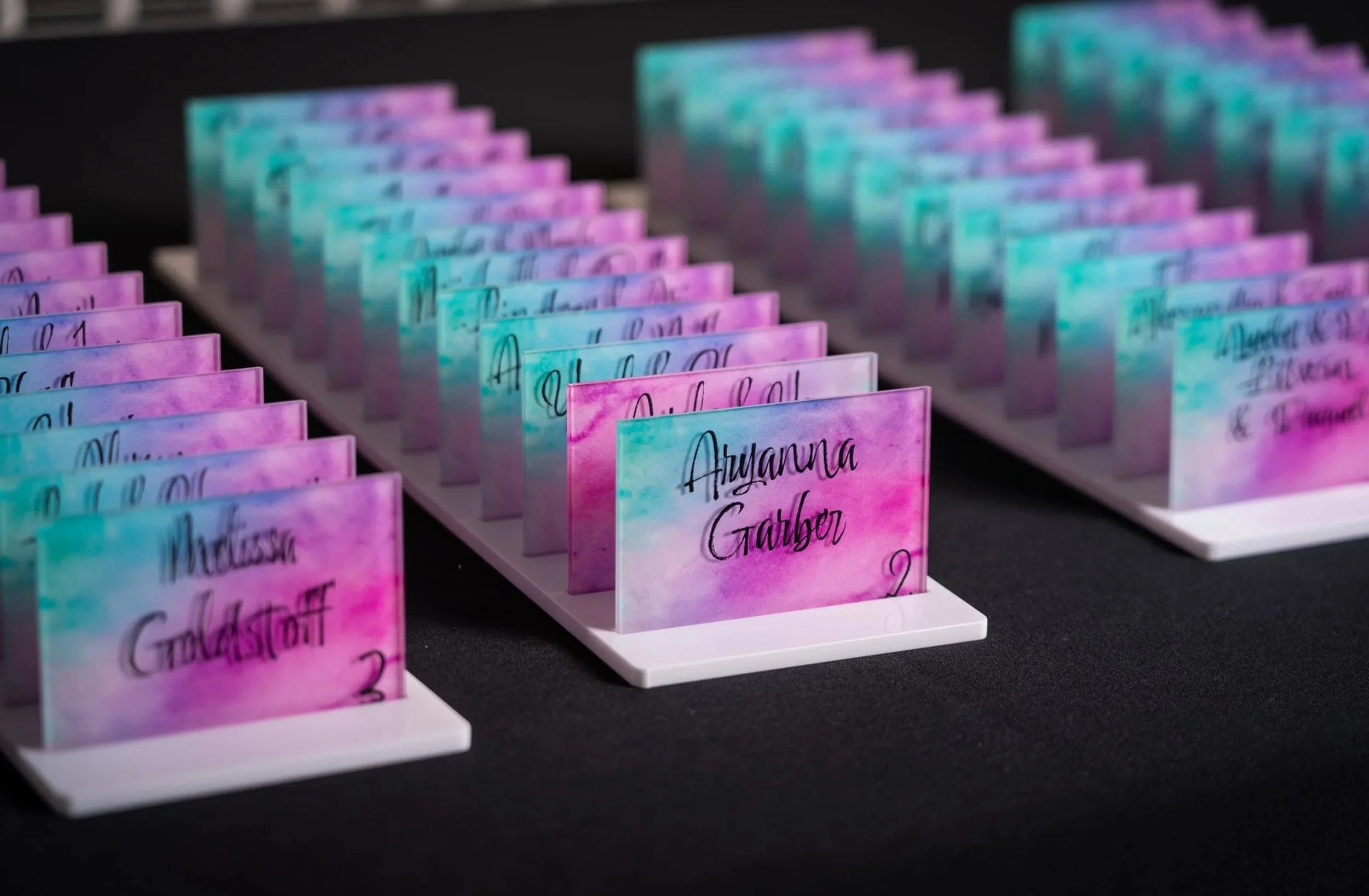 Custom watercolor escort cards. 