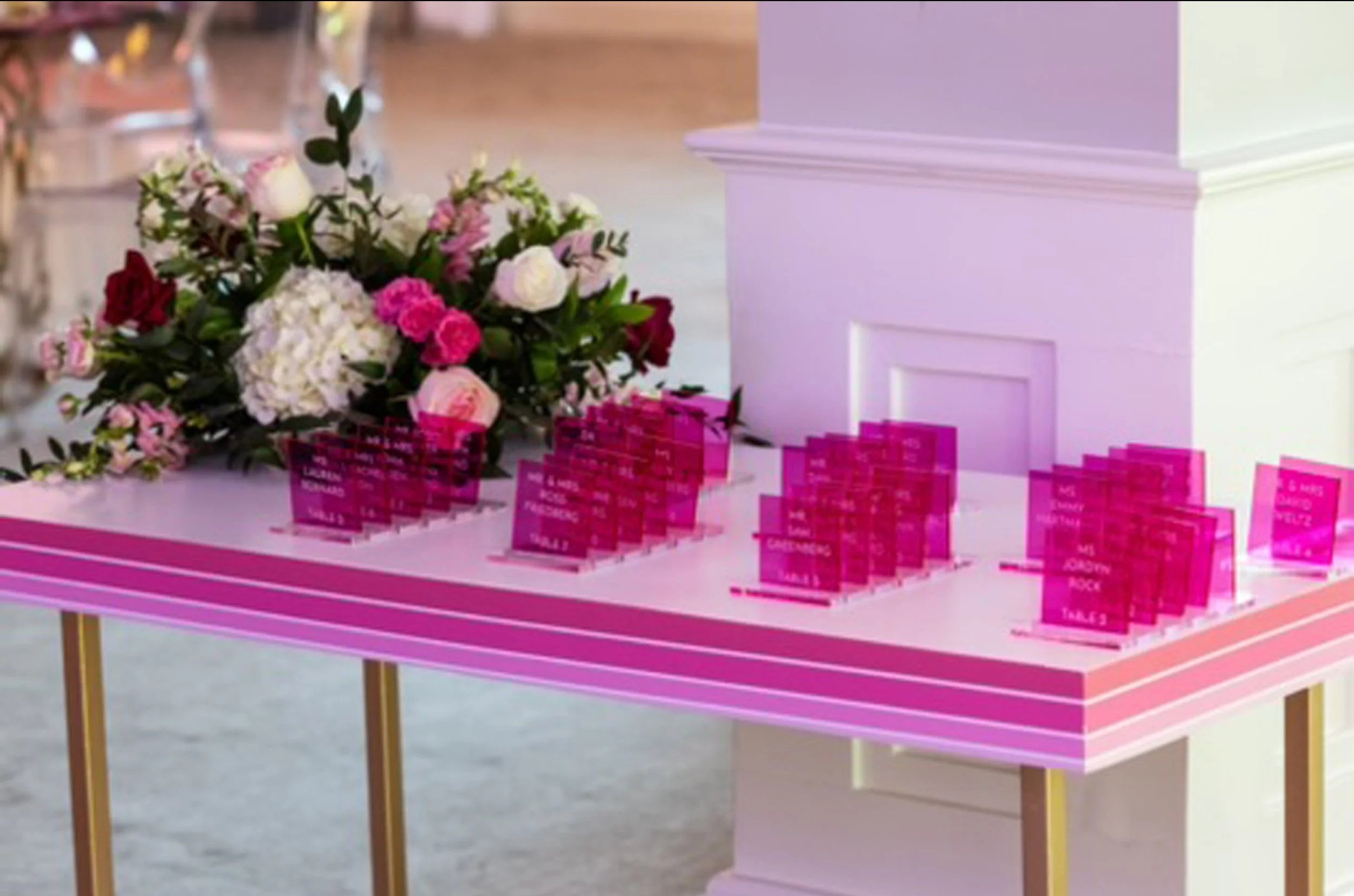 Fluorescent hot pink escort cards. 