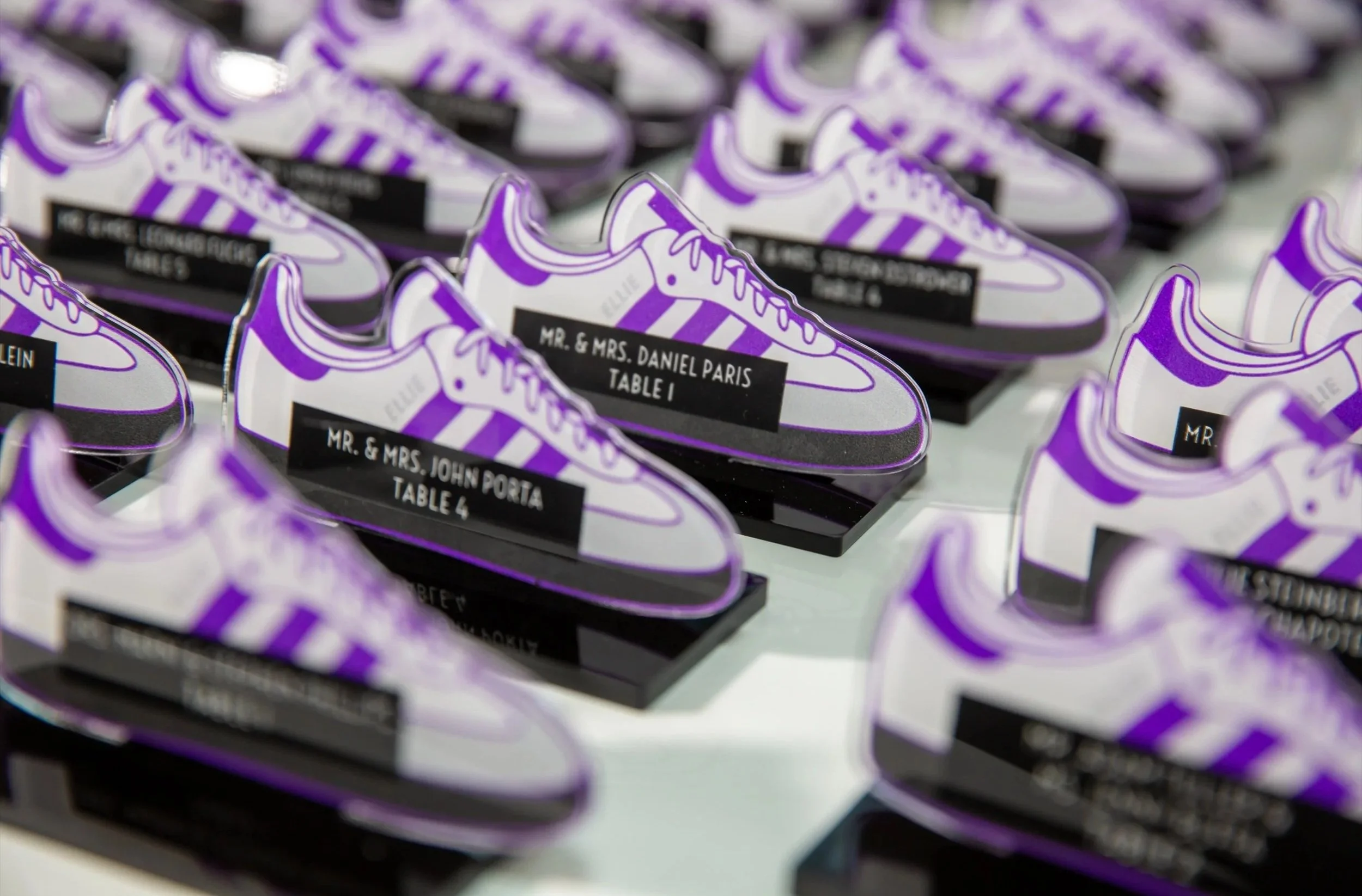 Purple and white escort cards. 