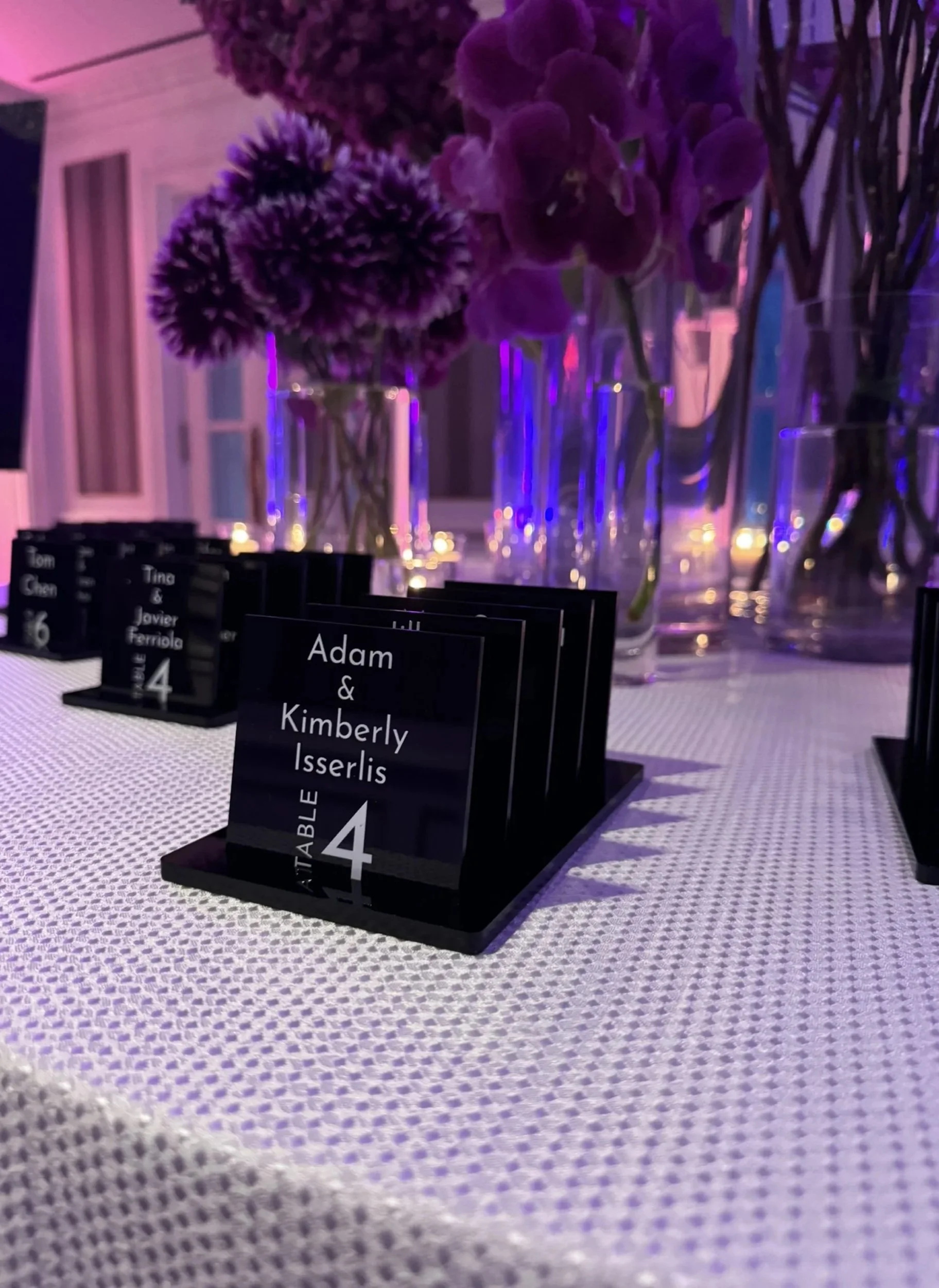 Black acrylic escort cards. 