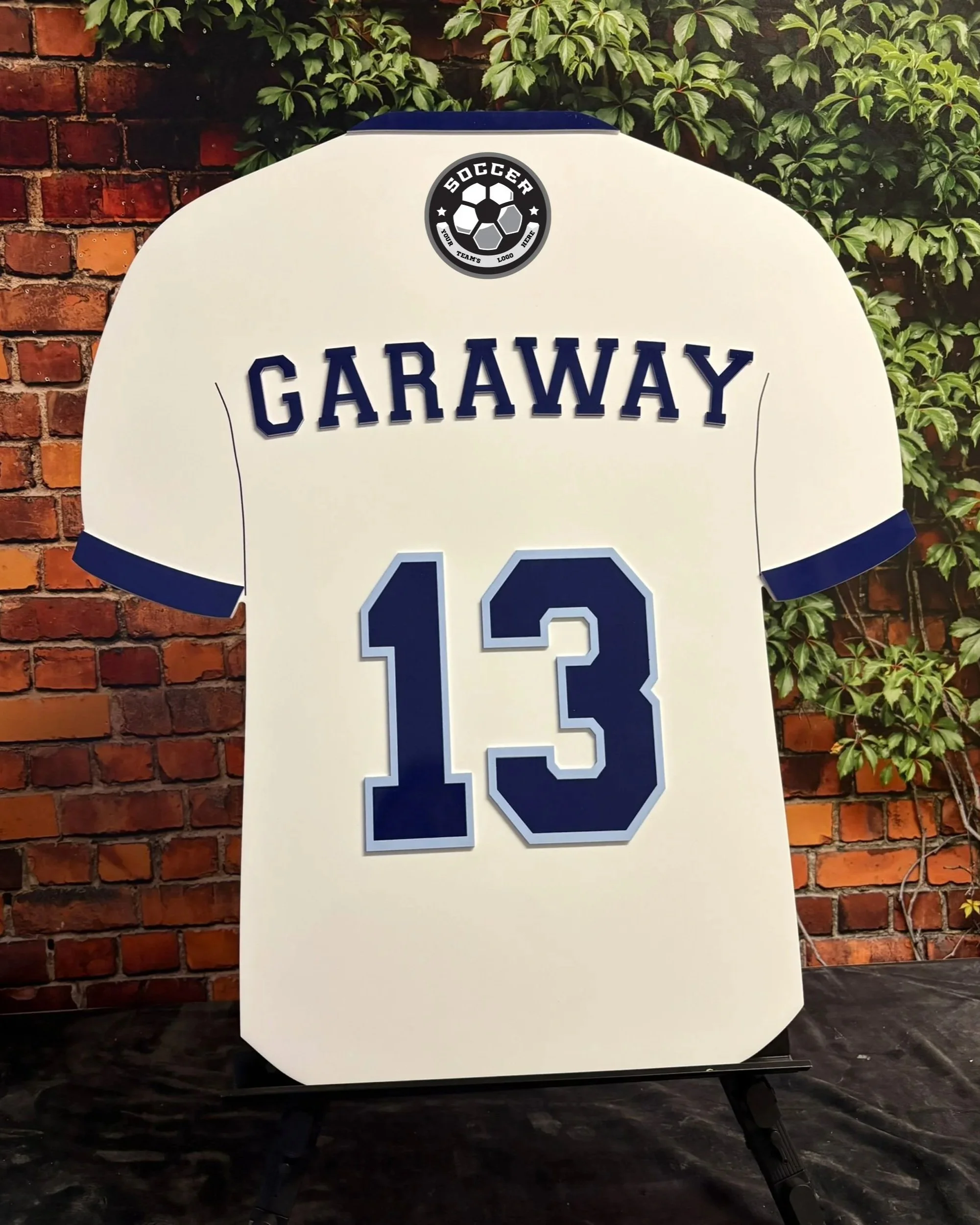 Custom blue and white soccer jersey sign-in board. 