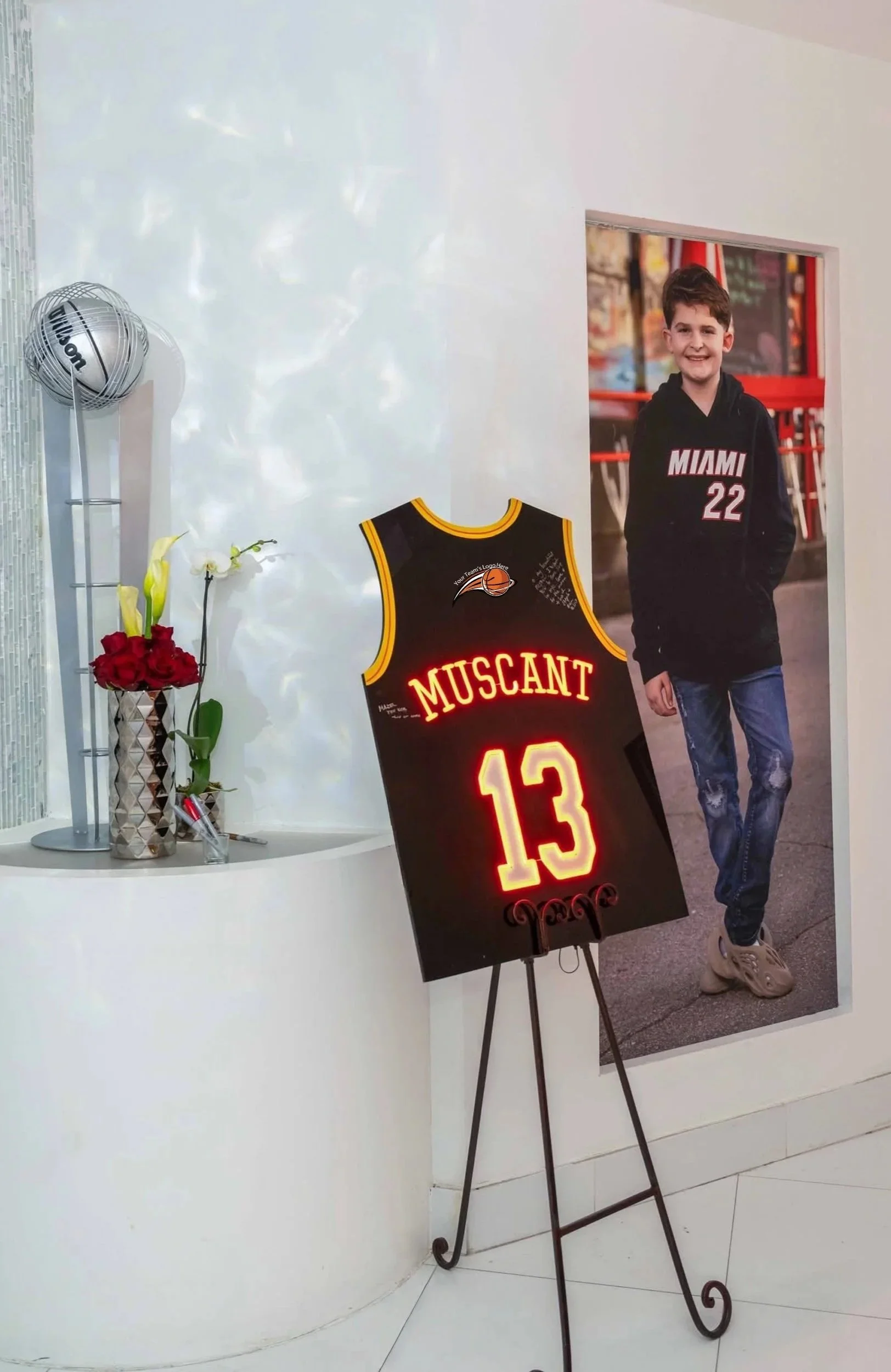 Custom black basketball jersey with red neon and yellow accents. 