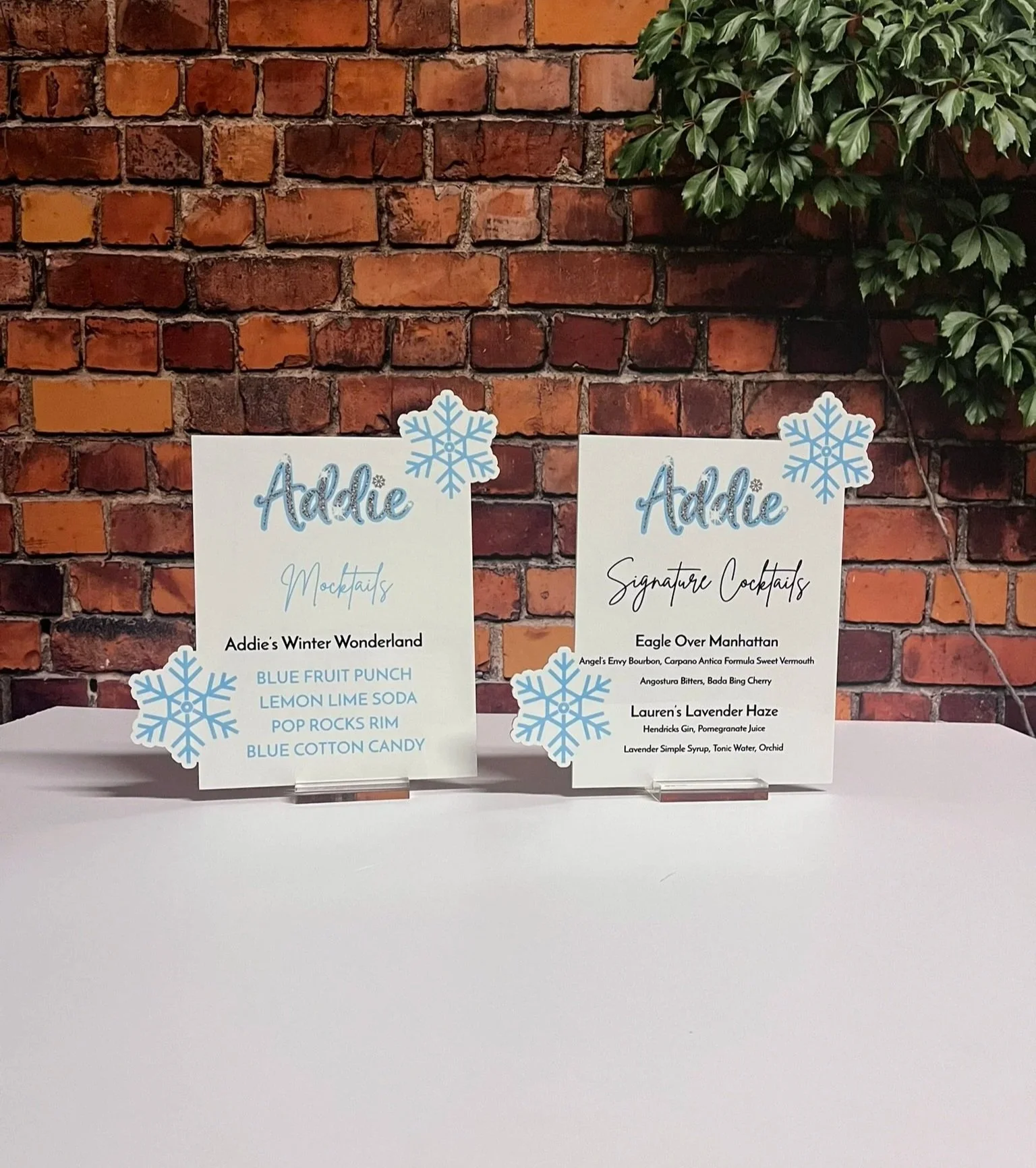 Winter themed drink menu with snowflakes.