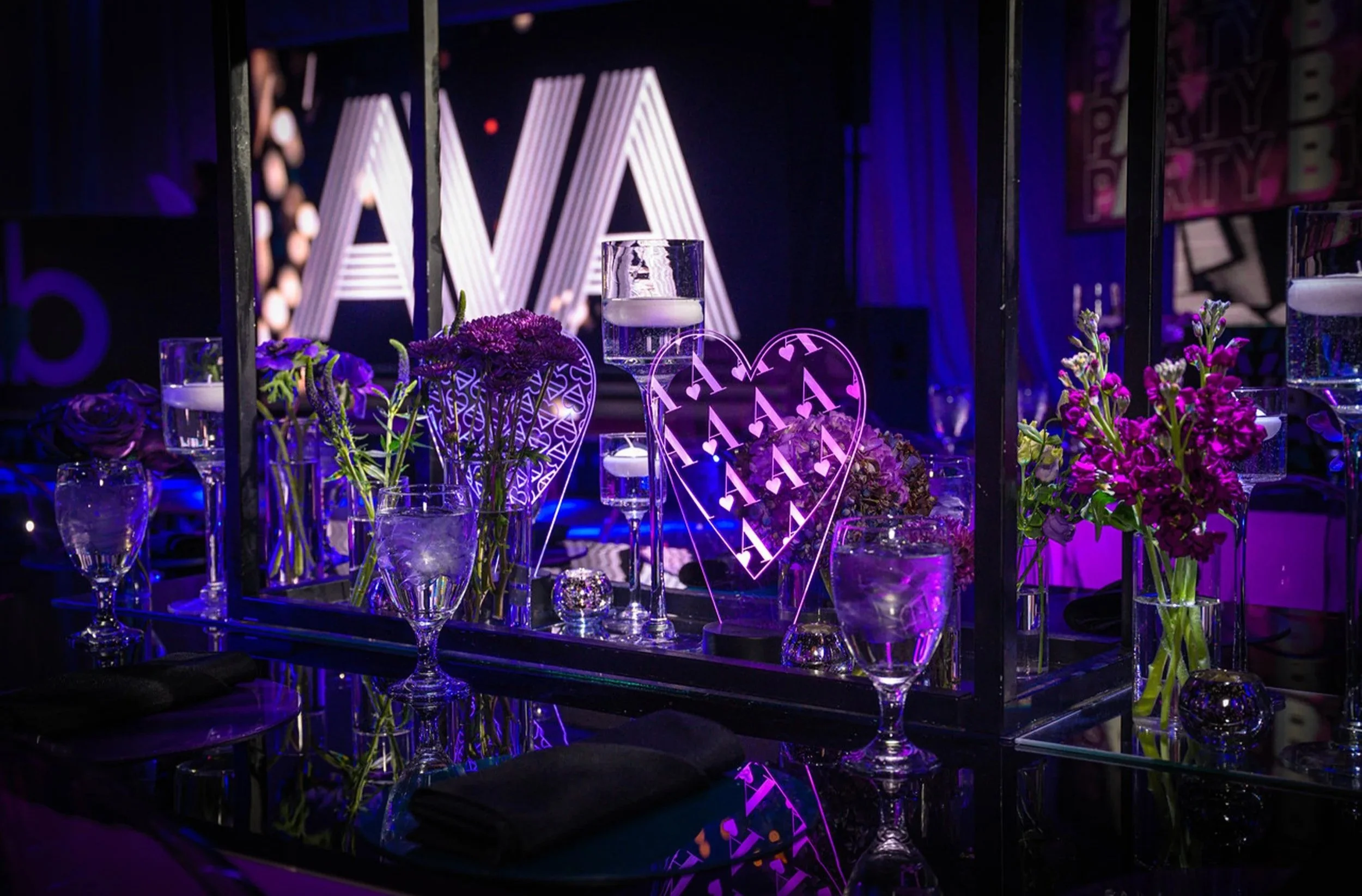 Custom LED centerpieces of hearts. 